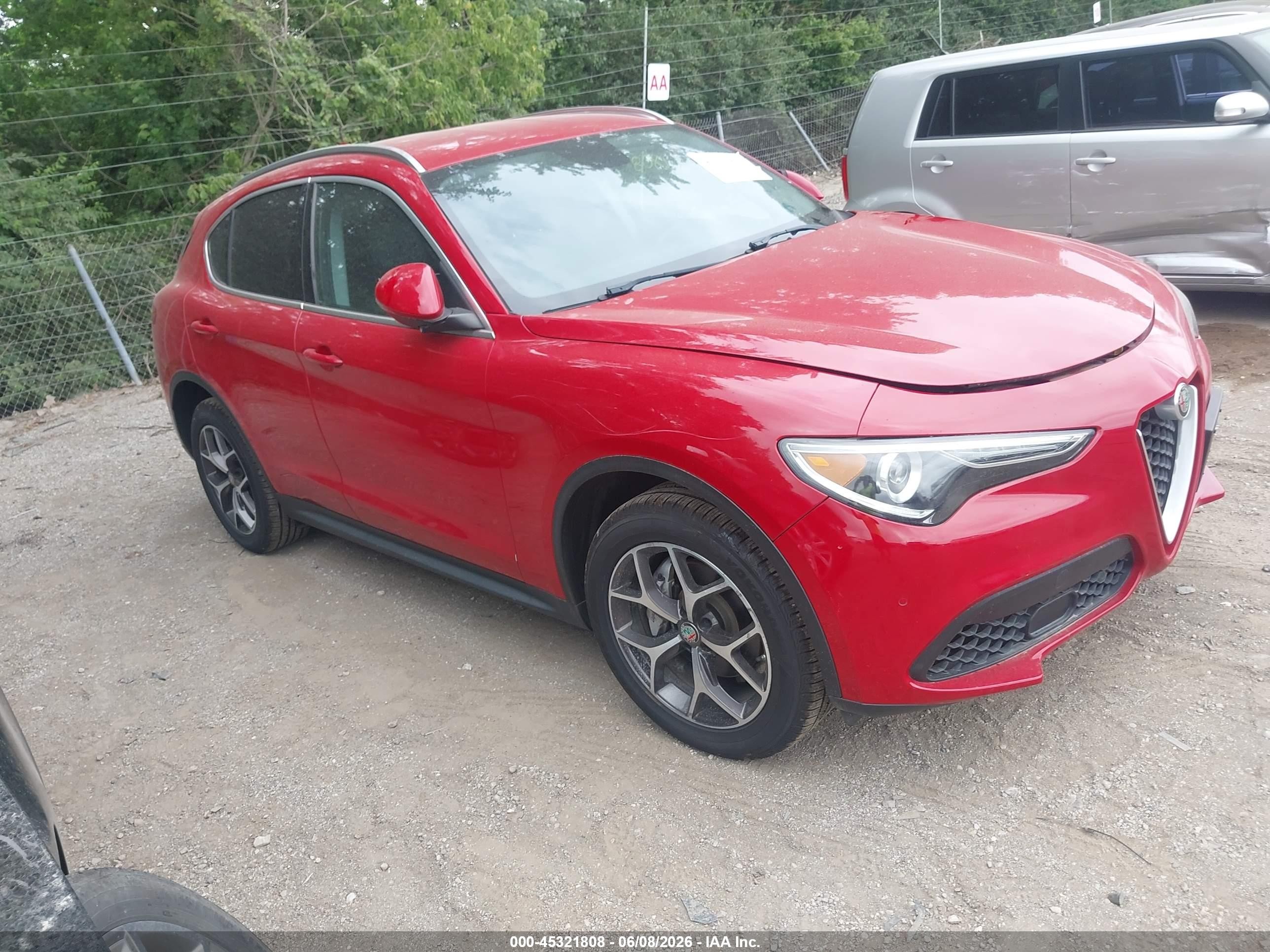 2019 Alfa Romeo Stelvio Ti Lusso, VIN ZASPAKBNXK7C31179 — Front end