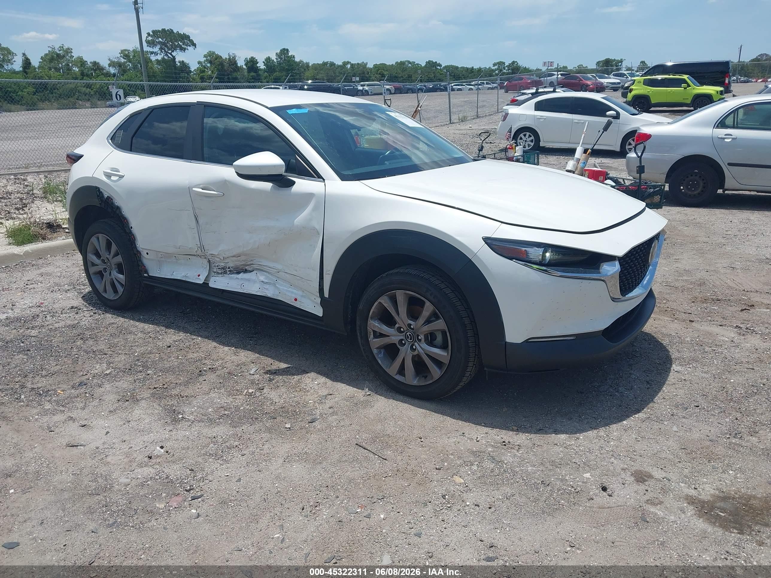2021 Mazda CX-30 Select, VIN 3MVDMABL3MM317002 — Side