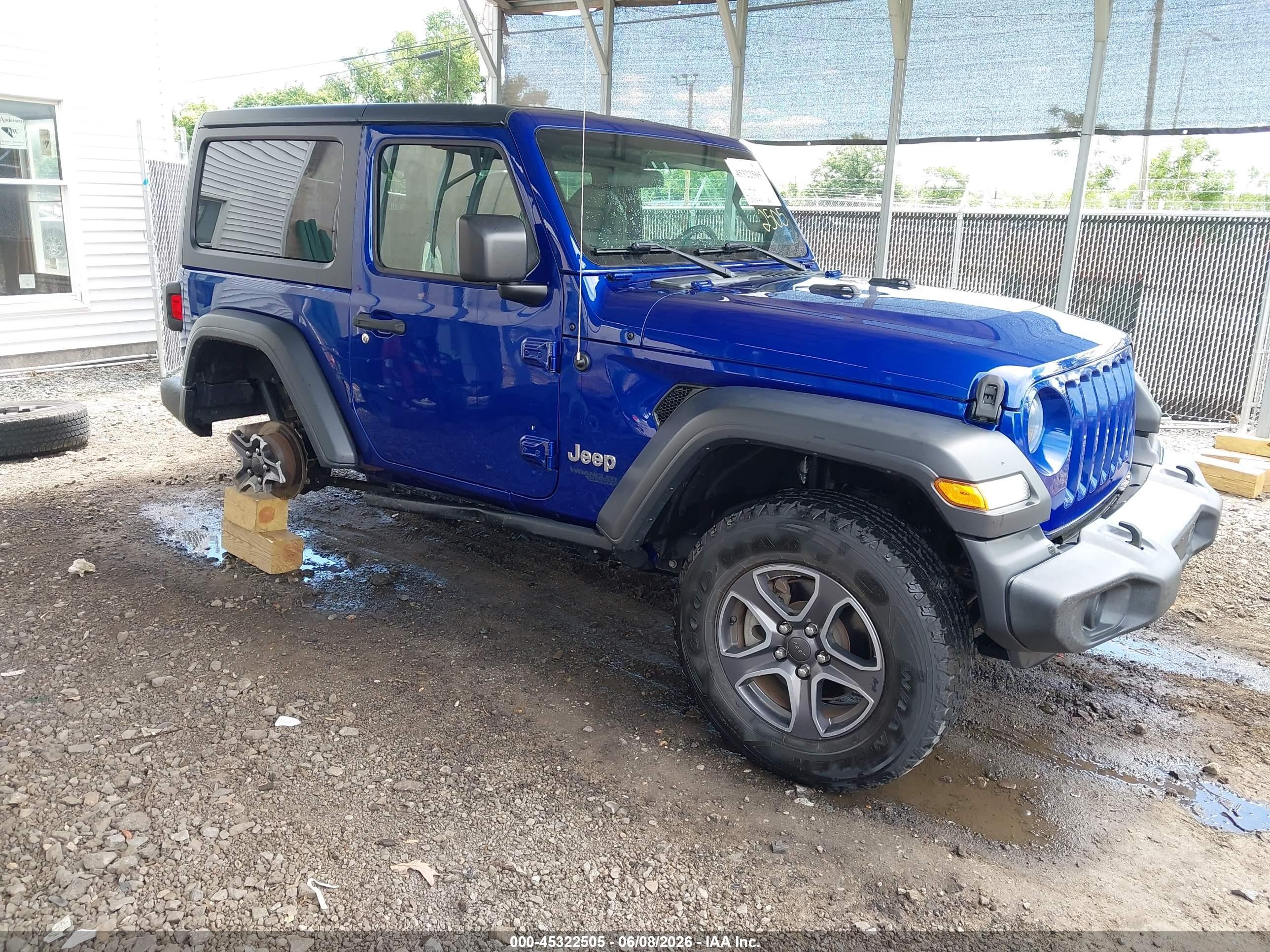 2019 Jeep Wrangler Sport S, VIN 1C4GJXAG5KW594715 — Side