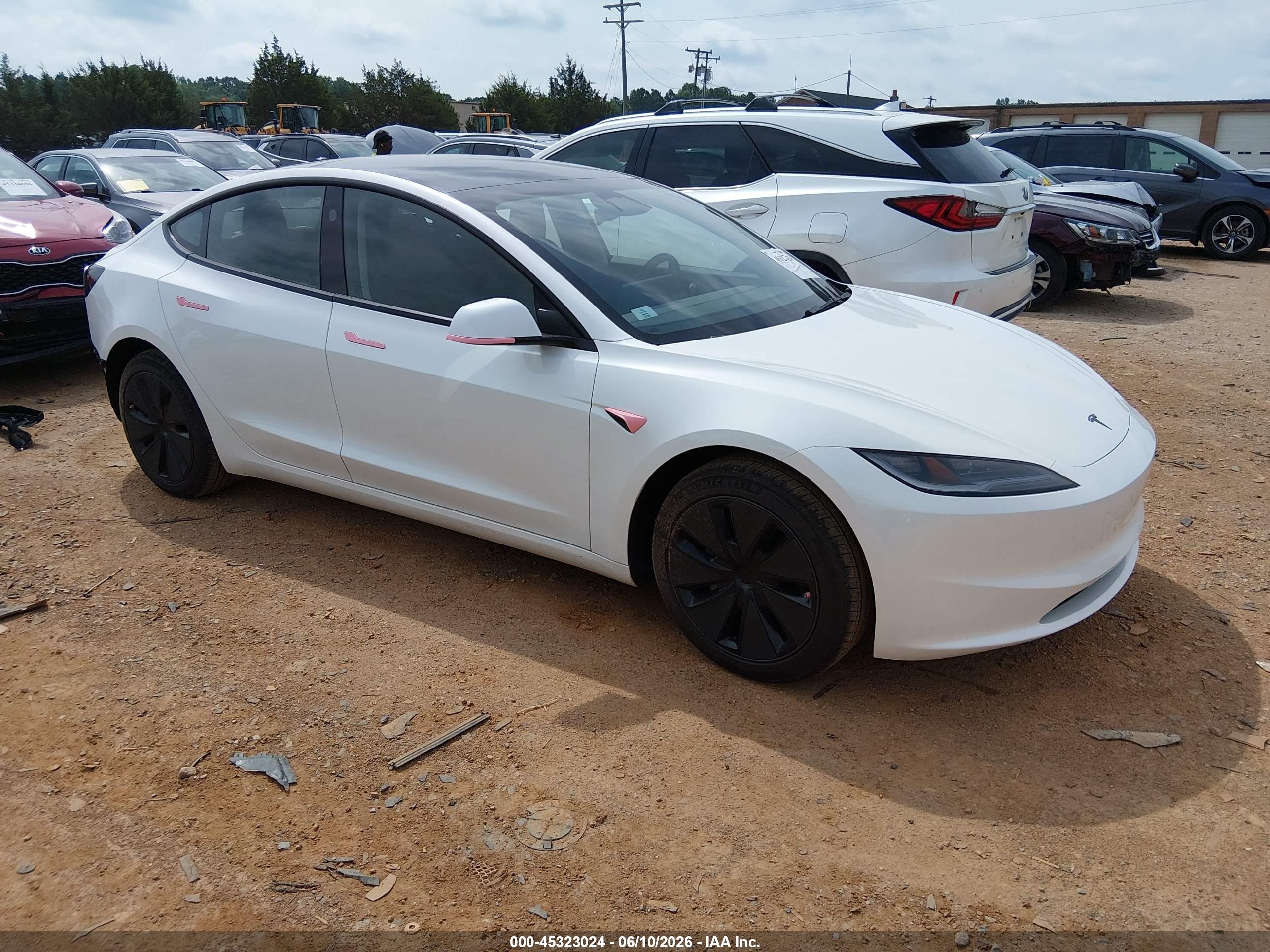 2026 Tesla Model 3 Premium, VIN 5YJ3E1EA4TF148891 — Rear end