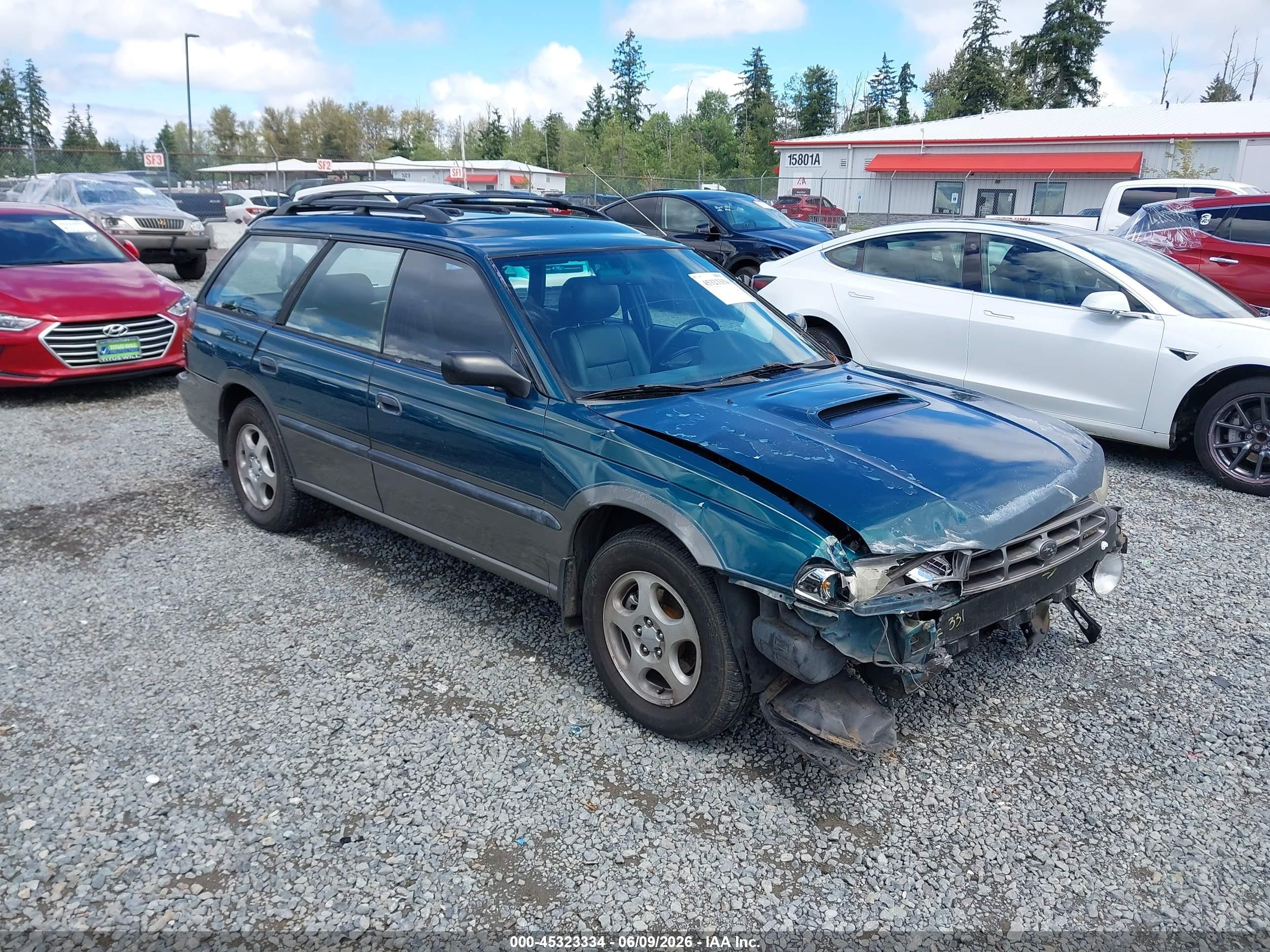 1997 Subaru Legacy Outback, VIN 4S3BG6857V7654788 — Front end