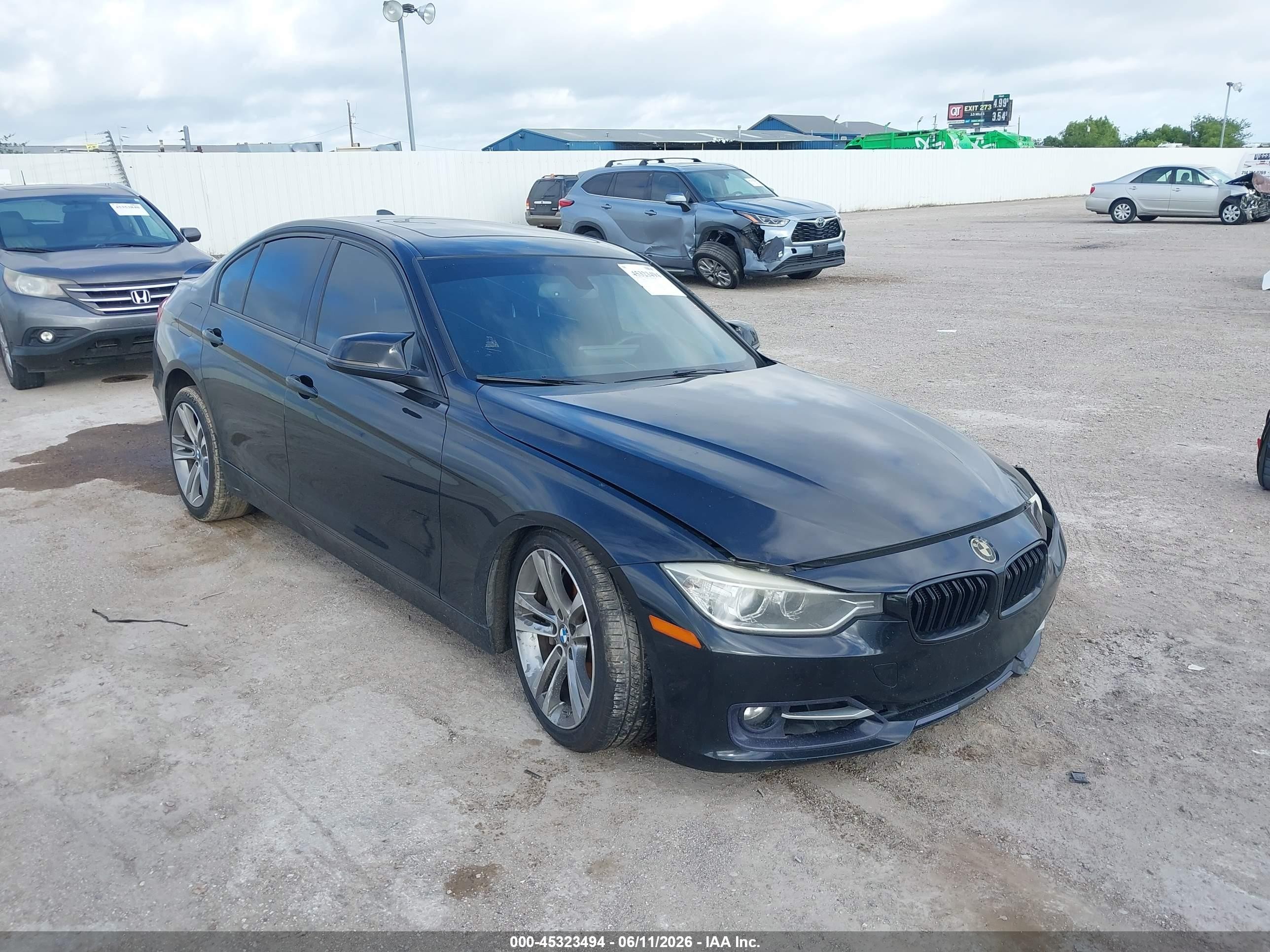 2013 BMW 3 Series 335i, VIN WBA3A9C50DF475993 — Front end