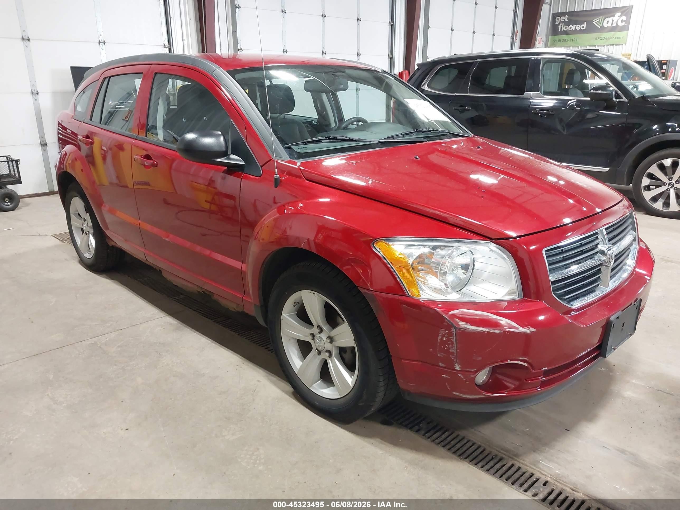 2010 Dodge Caliber Mainstreet, VIN 1B3CB3HA5AD642294 — Side