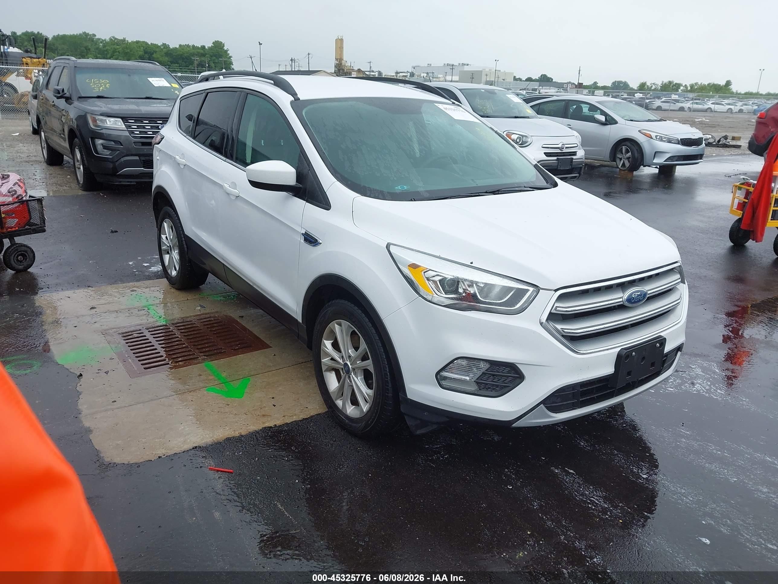 2017 Ford Escape SE, VIN 1FMCU0GDXHUD27340 — Side