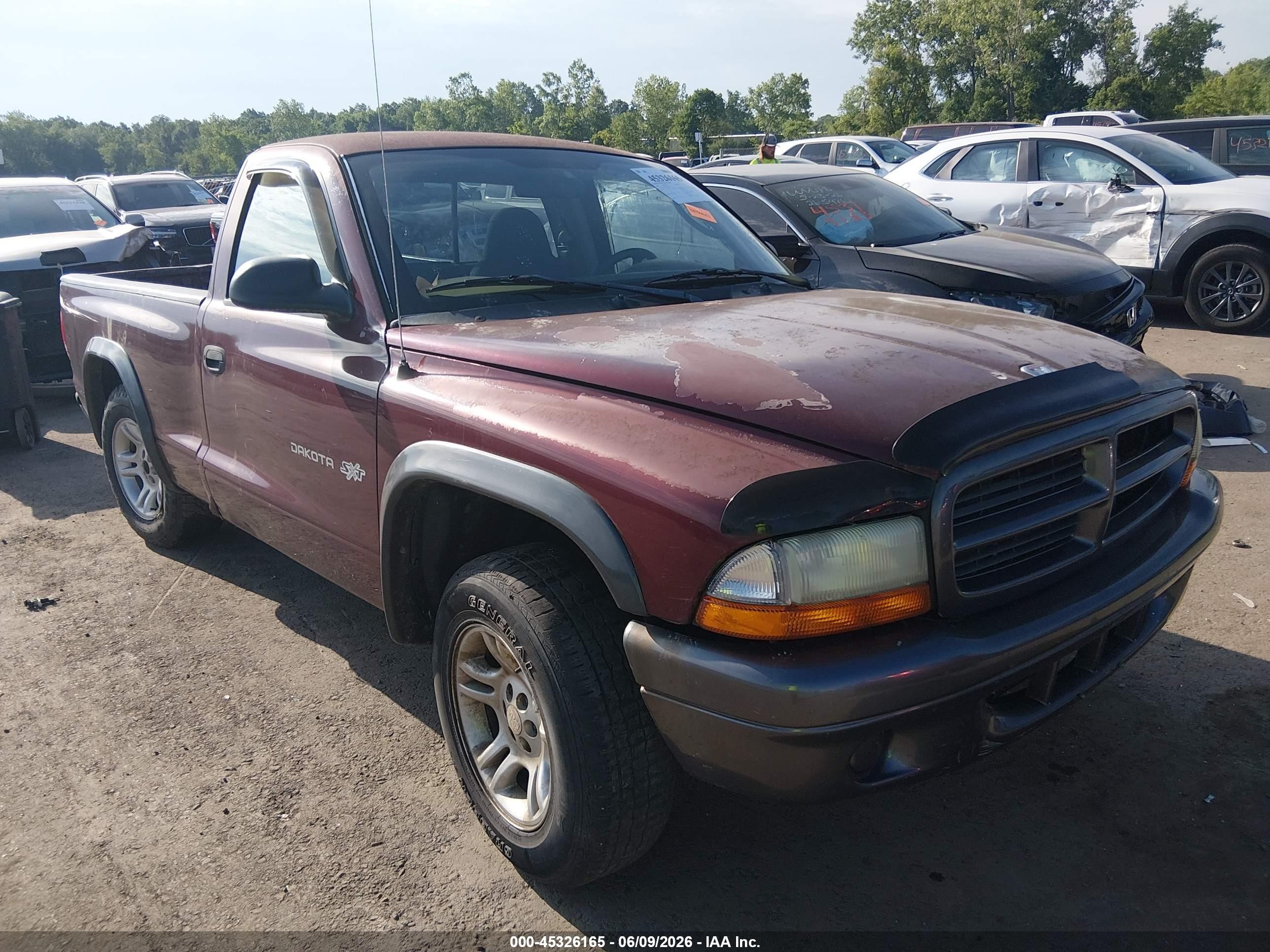 2002 Dodge Dakota, VIN 1B7FL16X42S622023 — Side