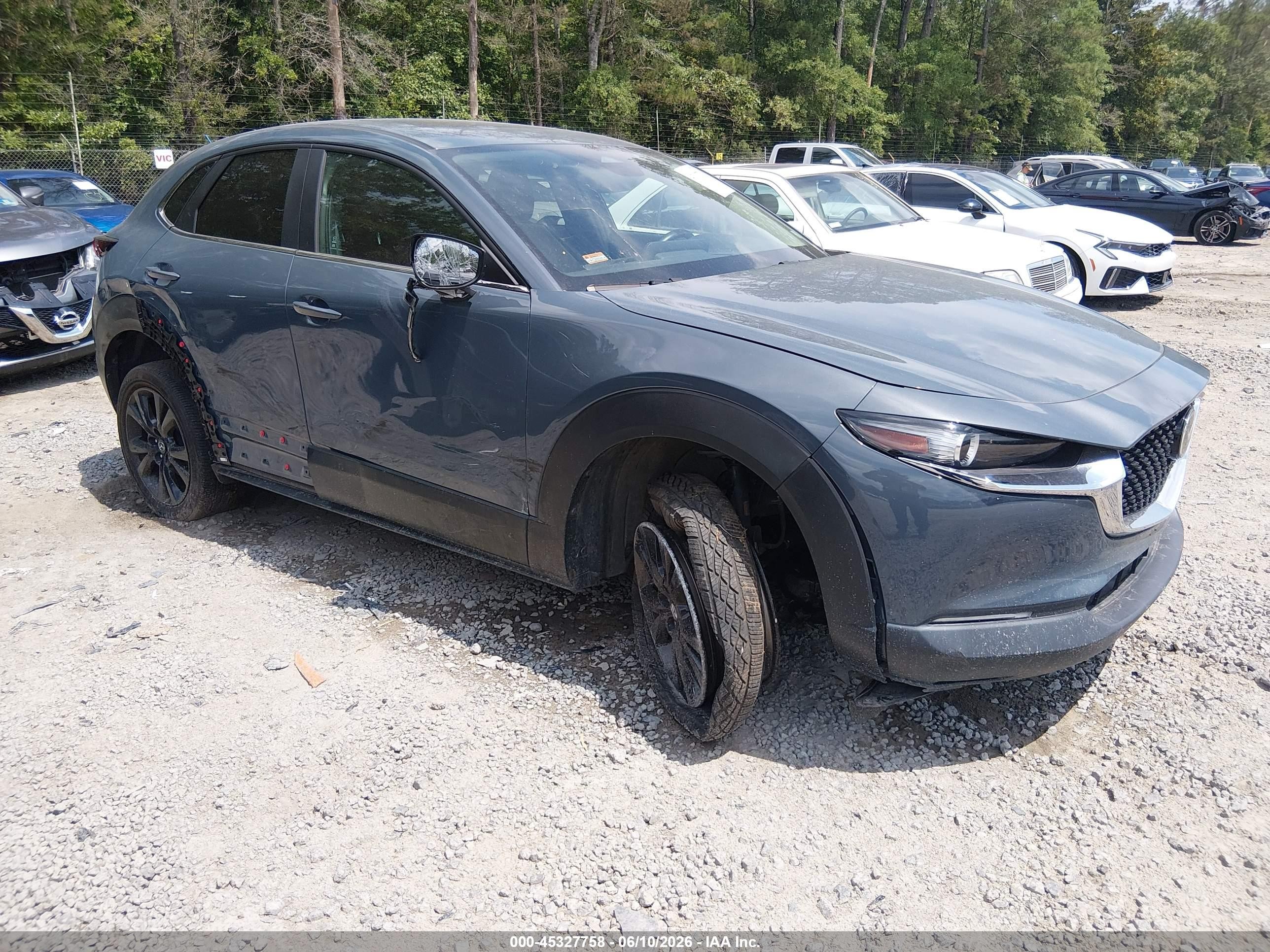 2024 Mazda CX-30 S Carbon Edition, VIN 3MVDMBCM5RM652282 — Side