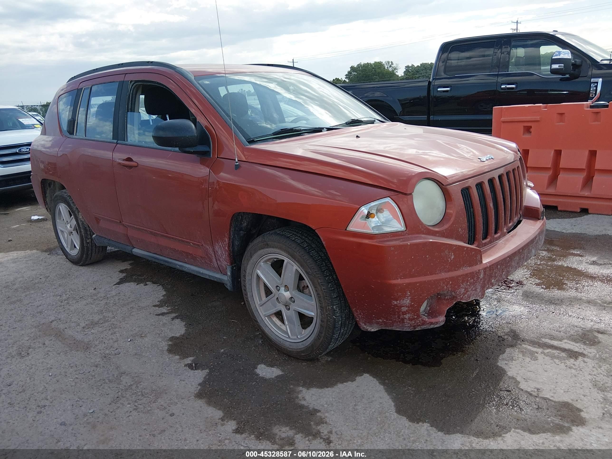 2010 Jeep Compass Sport, VIN 1J4NT4FB7AD571258 — Front end