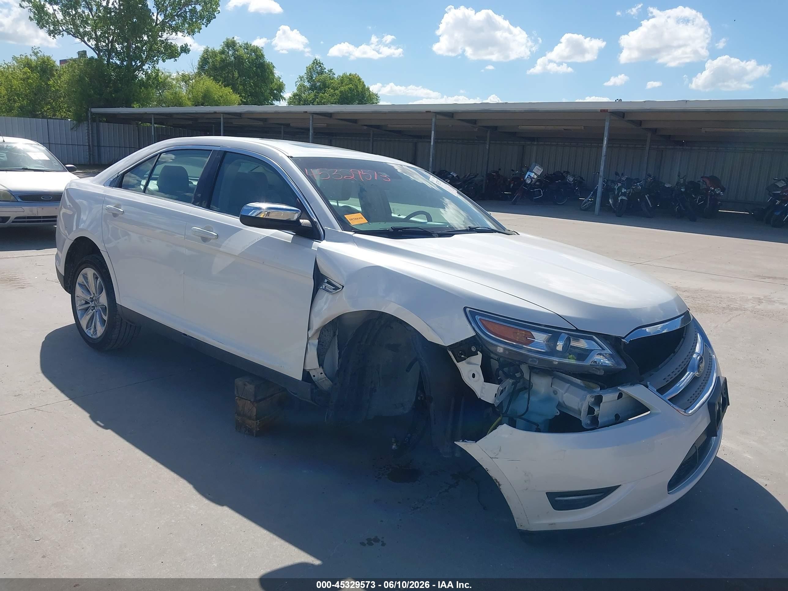 2012 Ford Taurus Limited, VIN 1FAHP2FW4CG143380 — Side