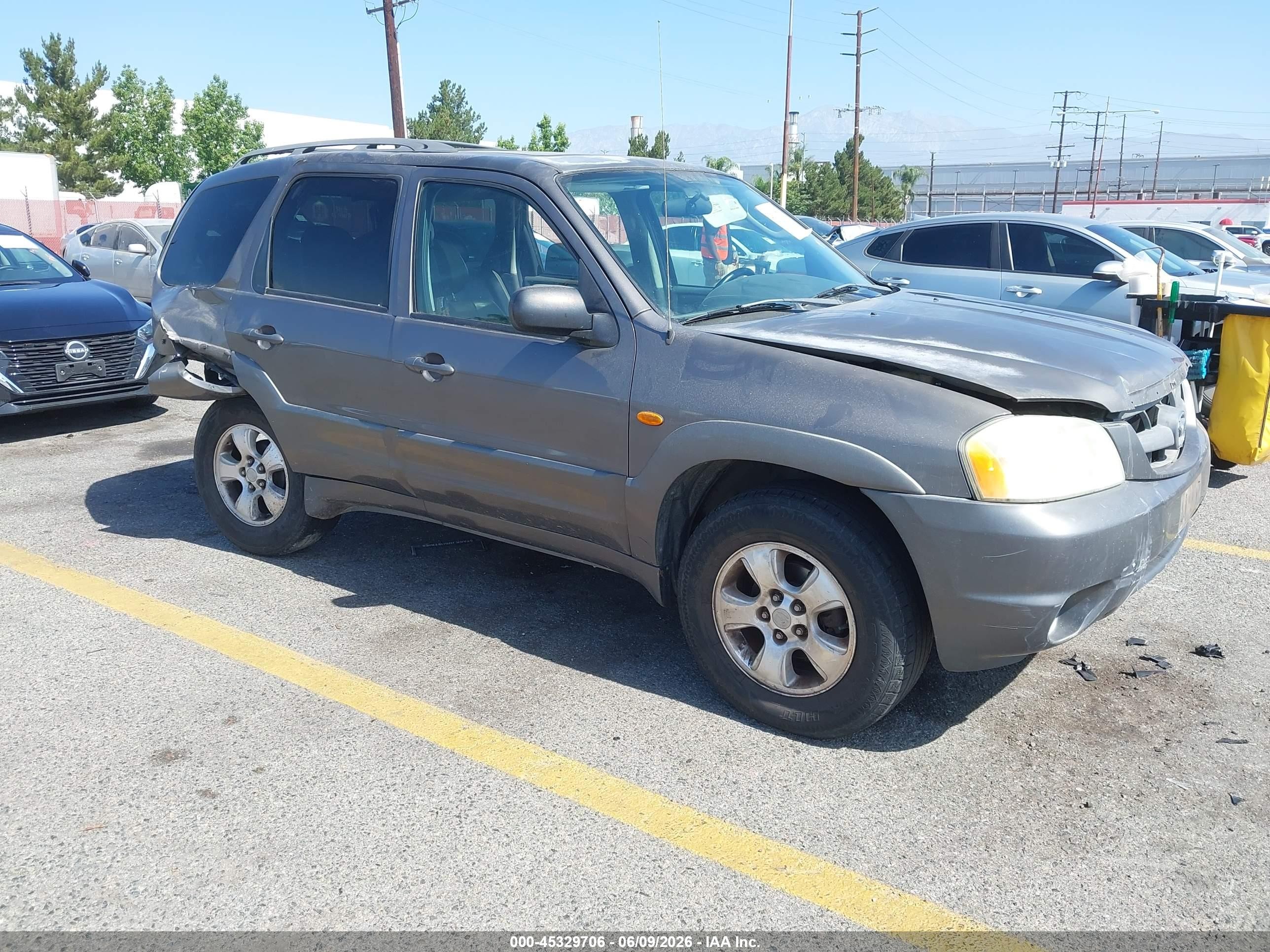 2003 Mazda Tribute ES, VIN 4F2CZ06113KM34780 — Rear end