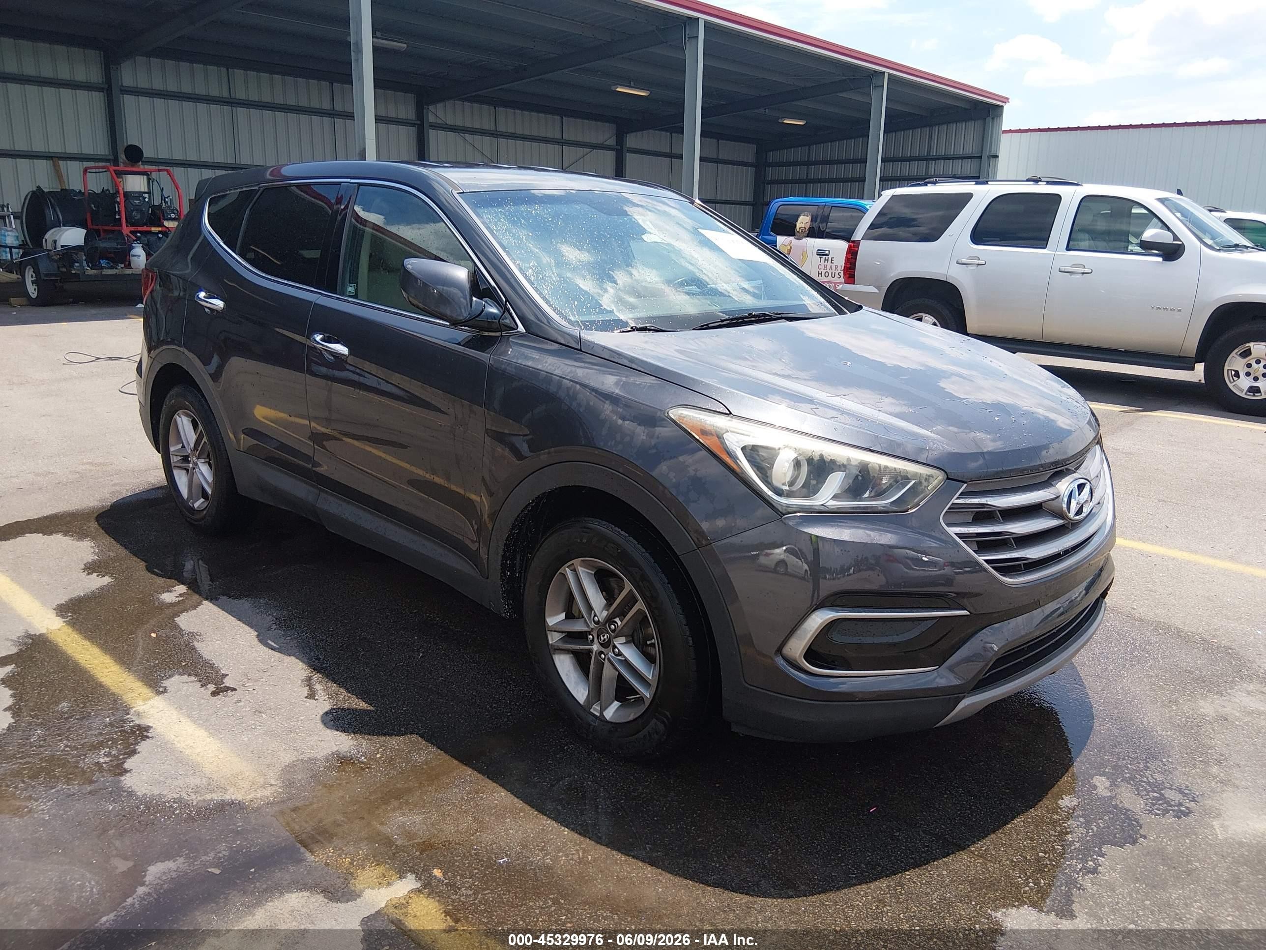 2017 Hyundai Santa Fe 2.4L, VIN 5XYZTDLB8HG456952 — Front end