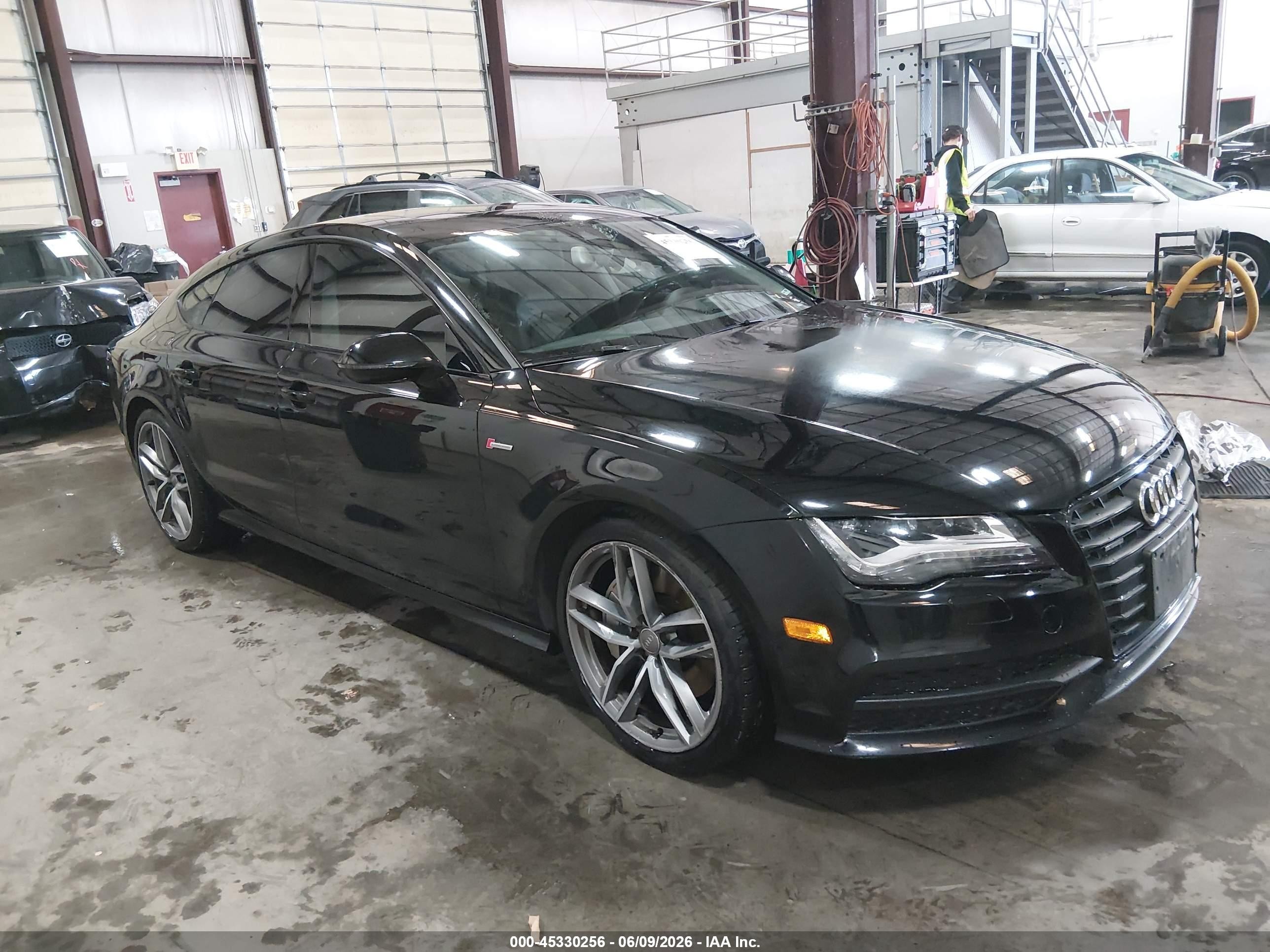 2015 Audi A7 Prestige, VIN WAU2GAFC1FN011920 — Зад