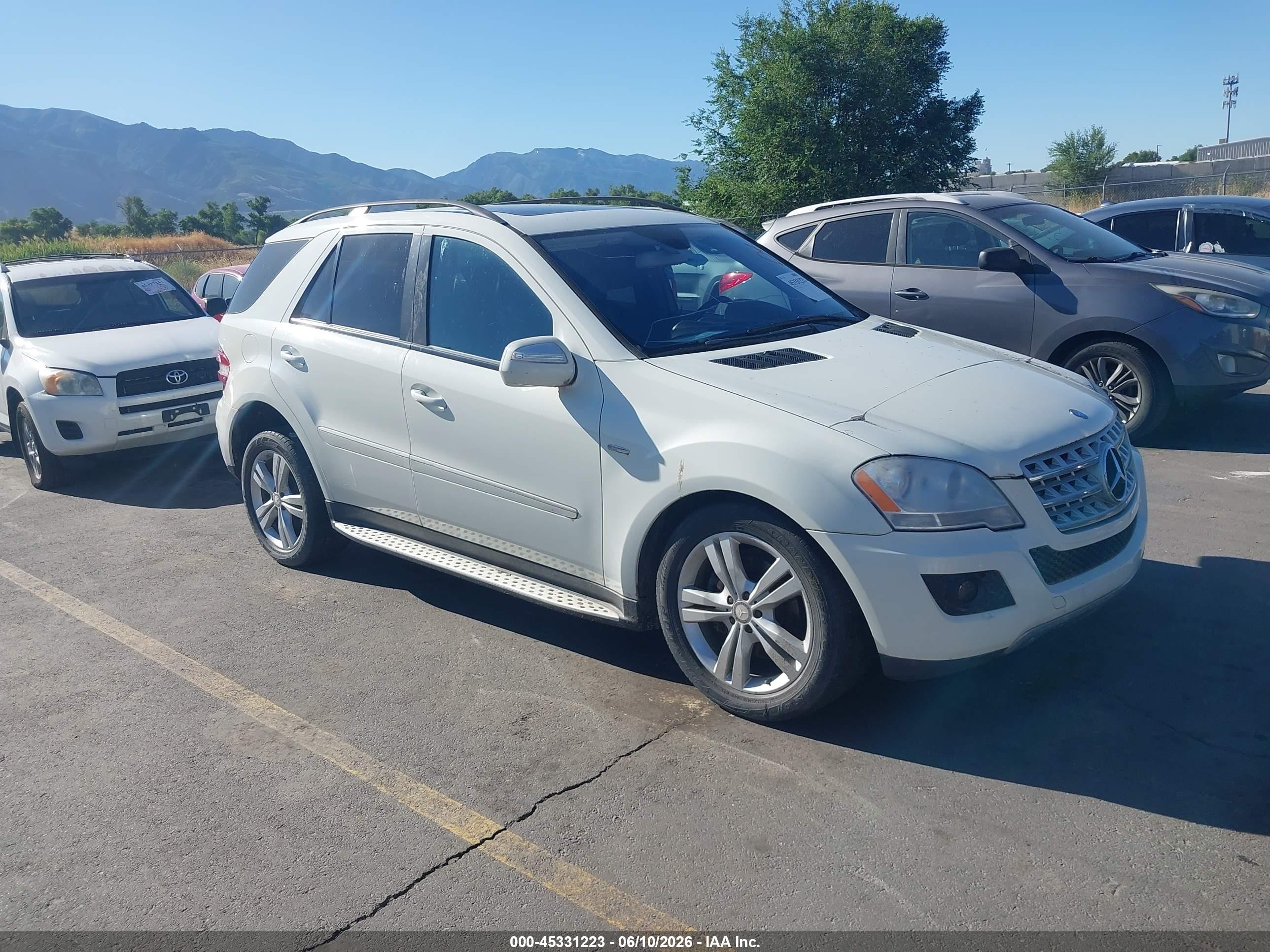 2009 Mercedes-Benz M 320, VIN 4JGBB25E89A516676 — Normal wear