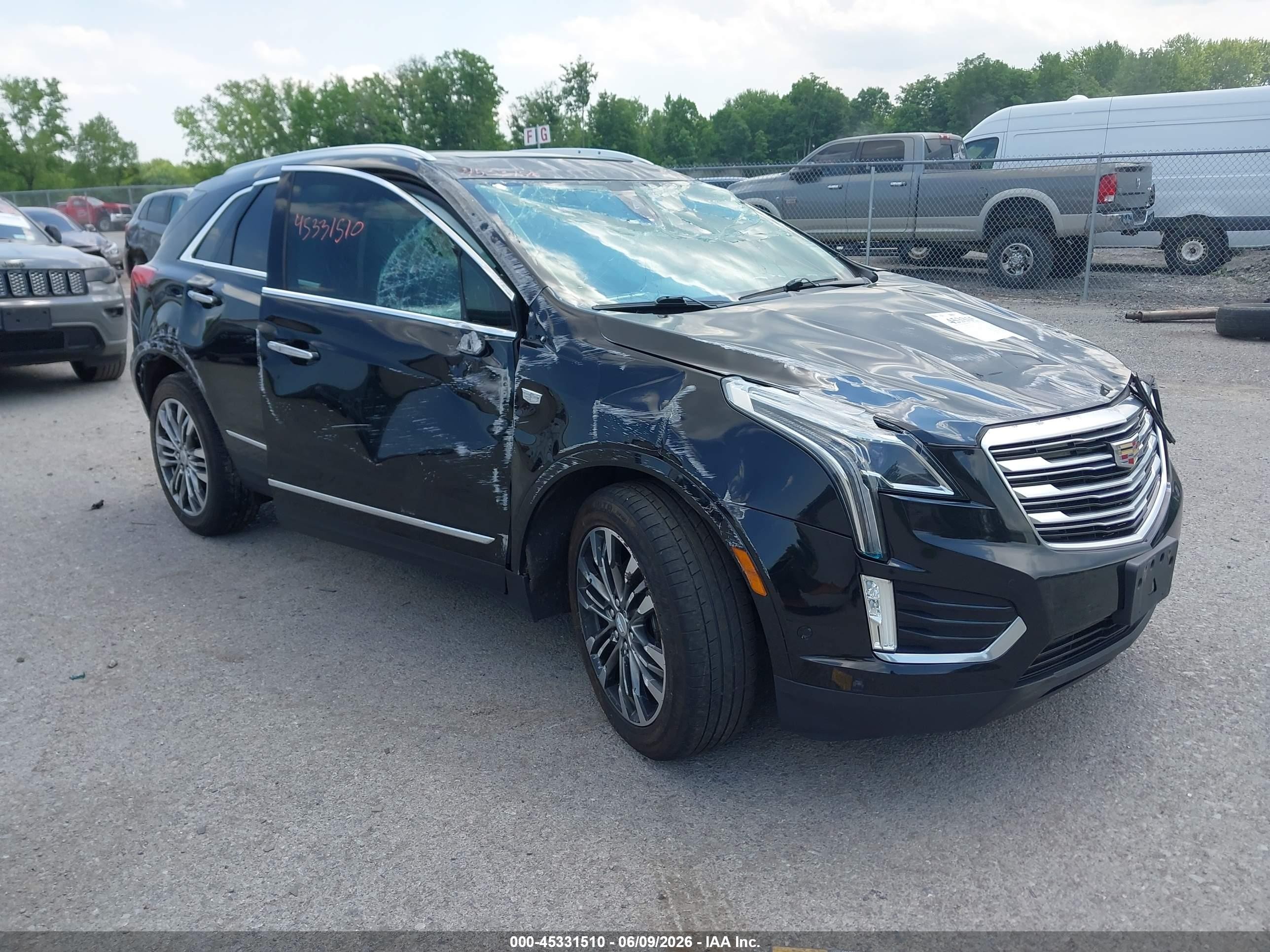 2017 Cadillac XT5 Premium Luxury AWD, VIN 1GYKNERS6HZ276583 — Rollover