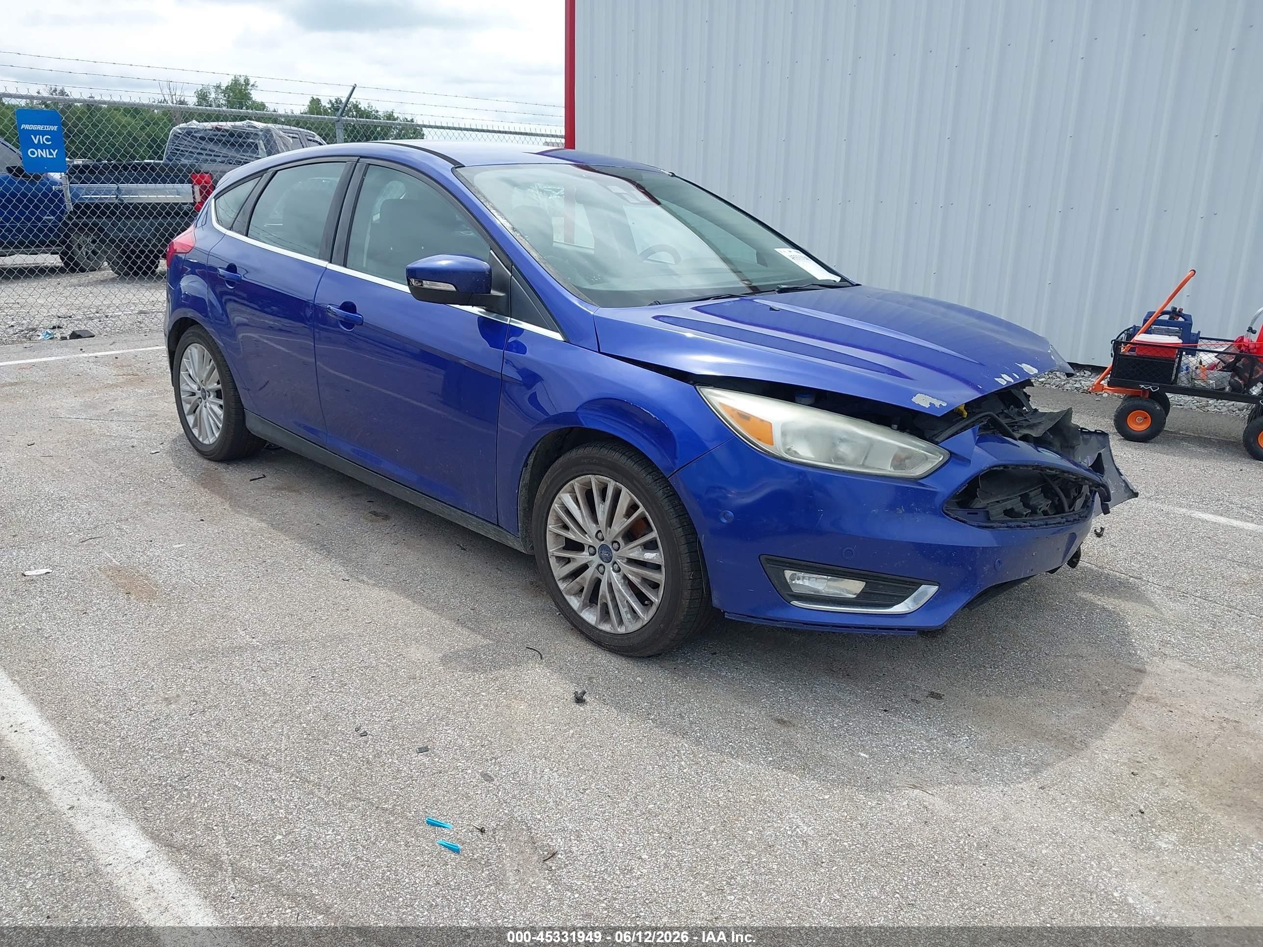 2015 Ford Focus Titanium, VIN 1FADP3N27FL252706 — Front end