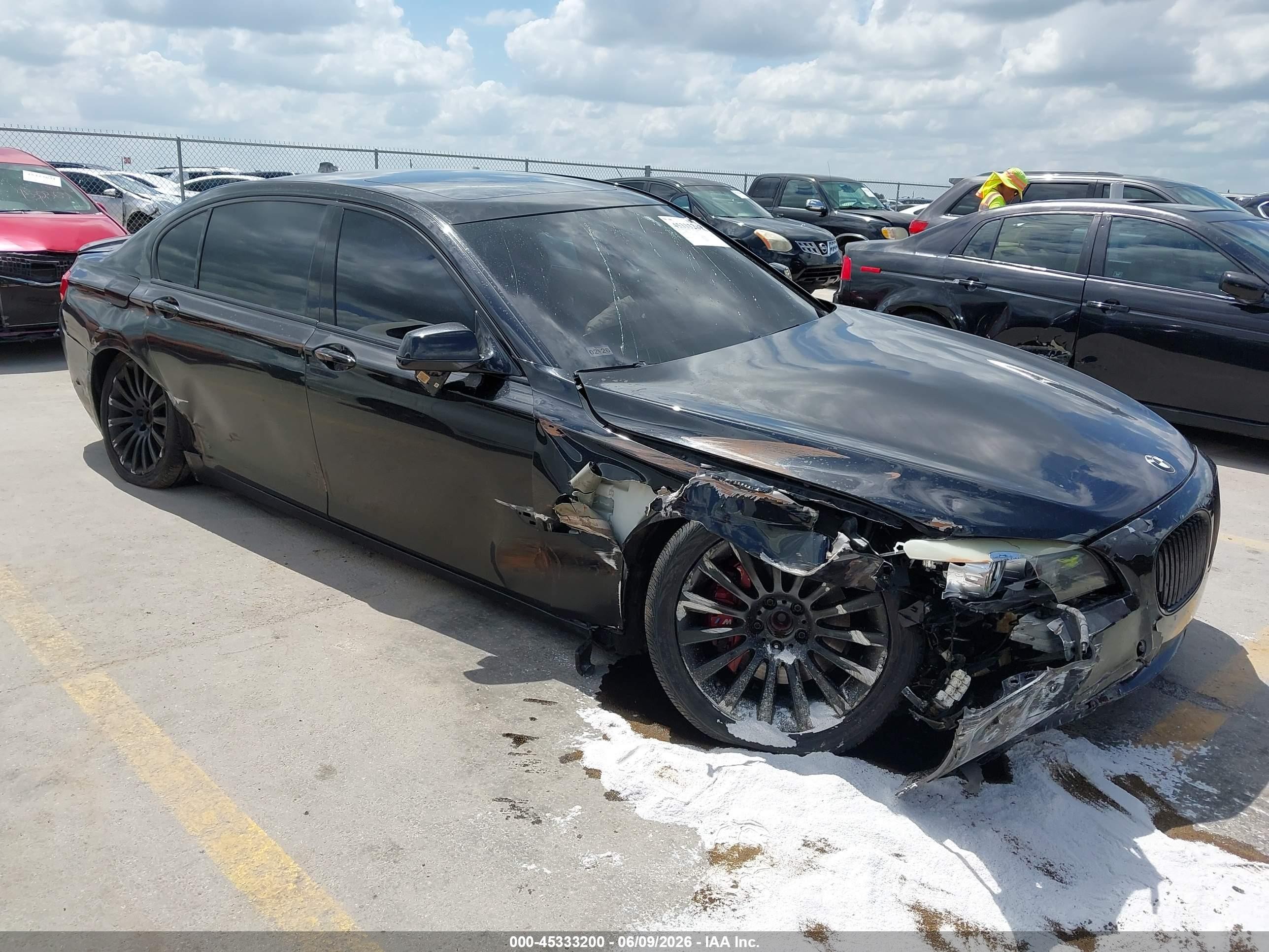 2011 BMW 7 Series 740Li, VIN WBAKB4C51BC573845 — Side