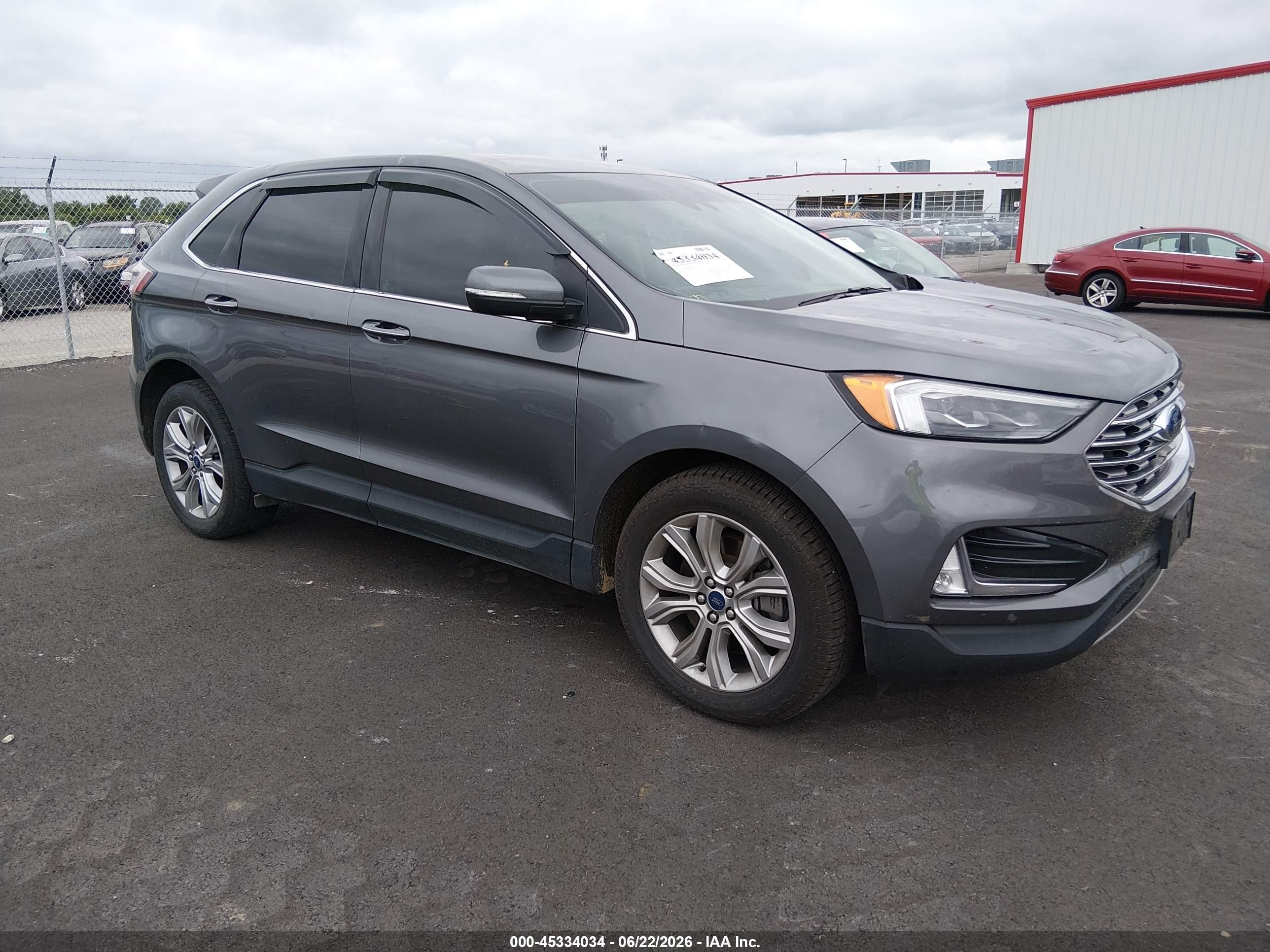 2022 Ford Edge Titanium, VIN 2FMPK4K93NBB04320 — Hail