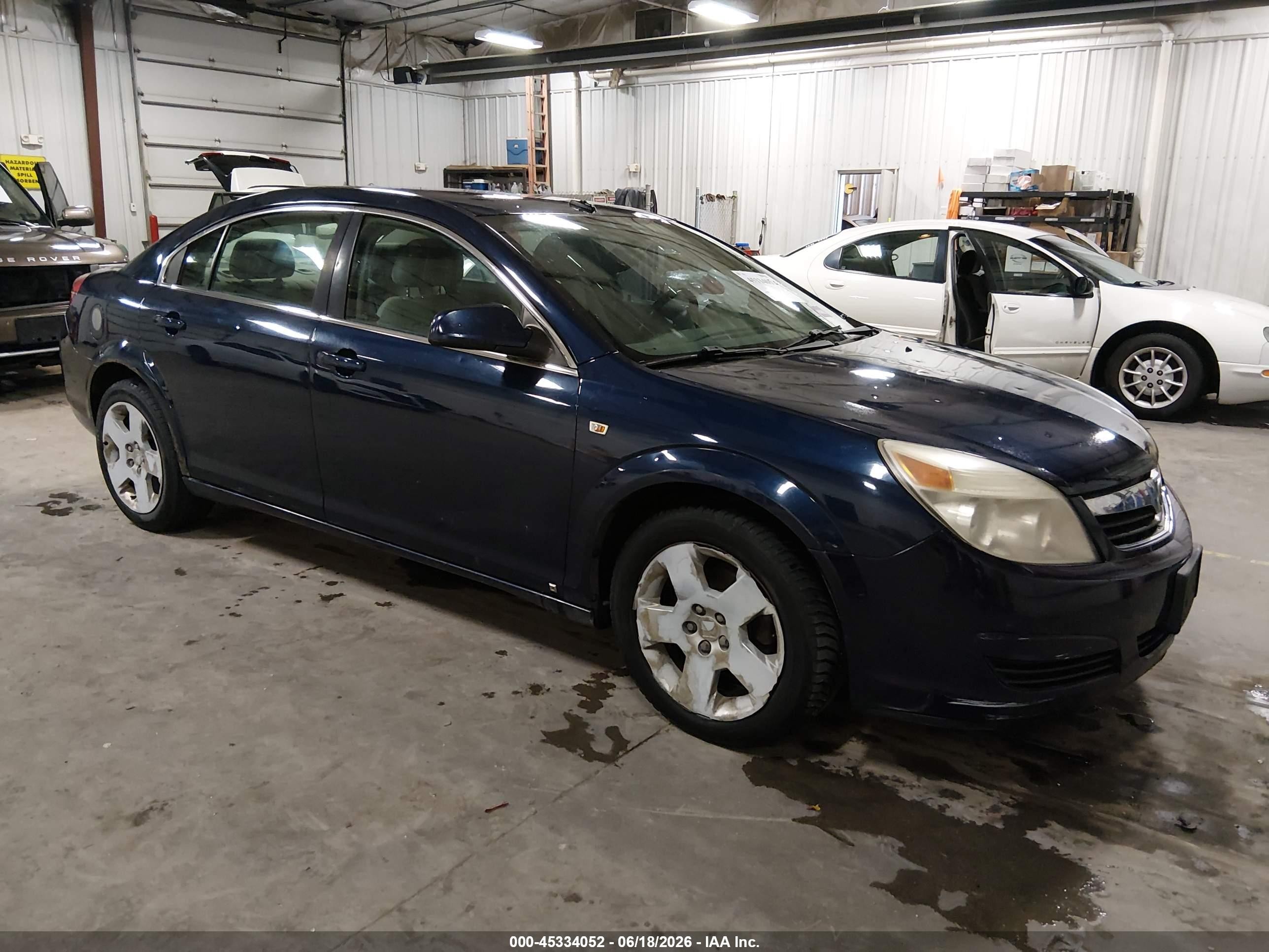 2009 Saturn Aura XE, VIN 1G8ZS57B29F113443 — Hail