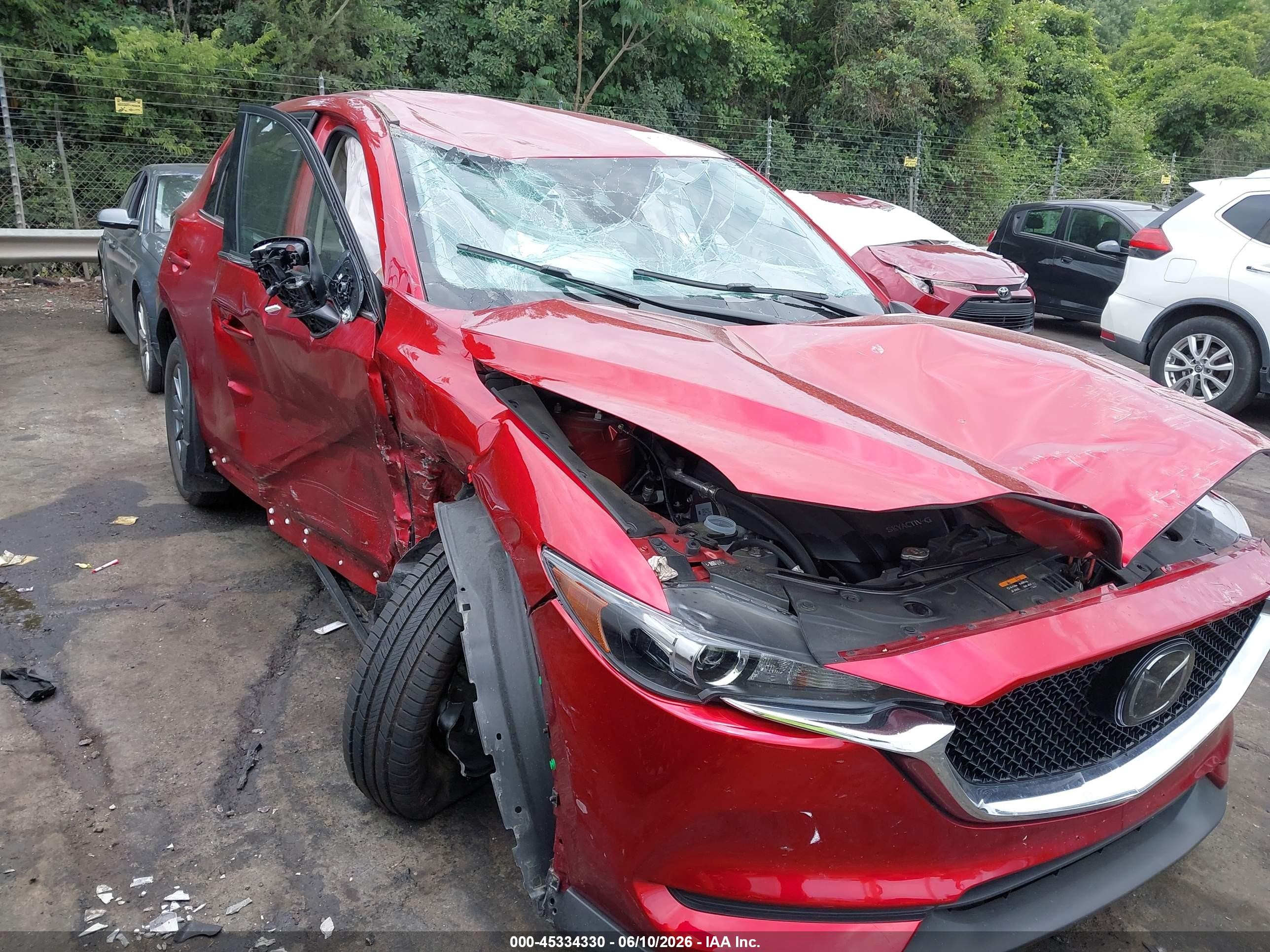 2021 Mazda CX-5 Touring, VIN JM3KFBCM7M0386432 — Rollover