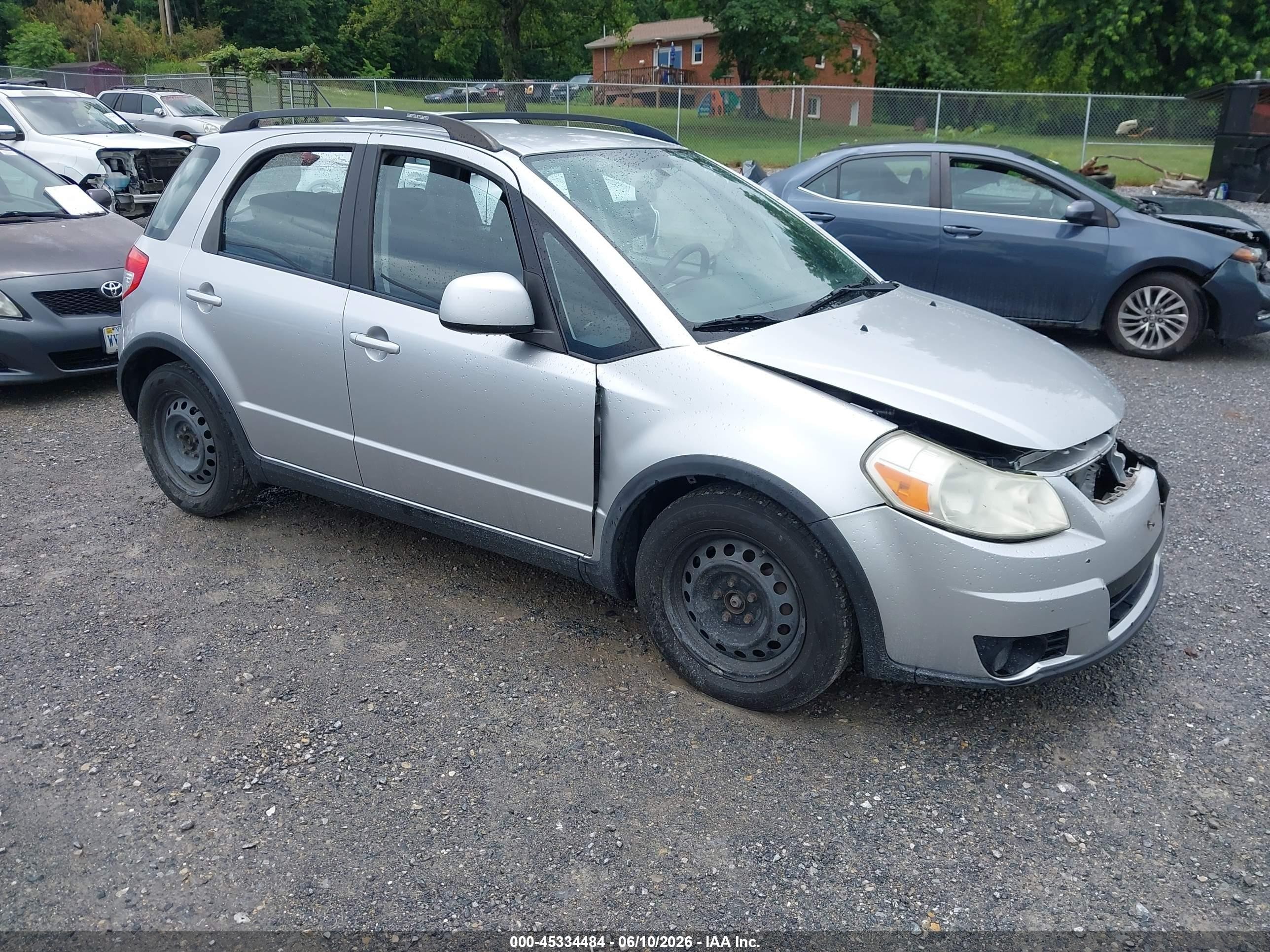 2011 Suzuki SX4 Crossover, VIN JS2YB5A34B6303114 — Перед