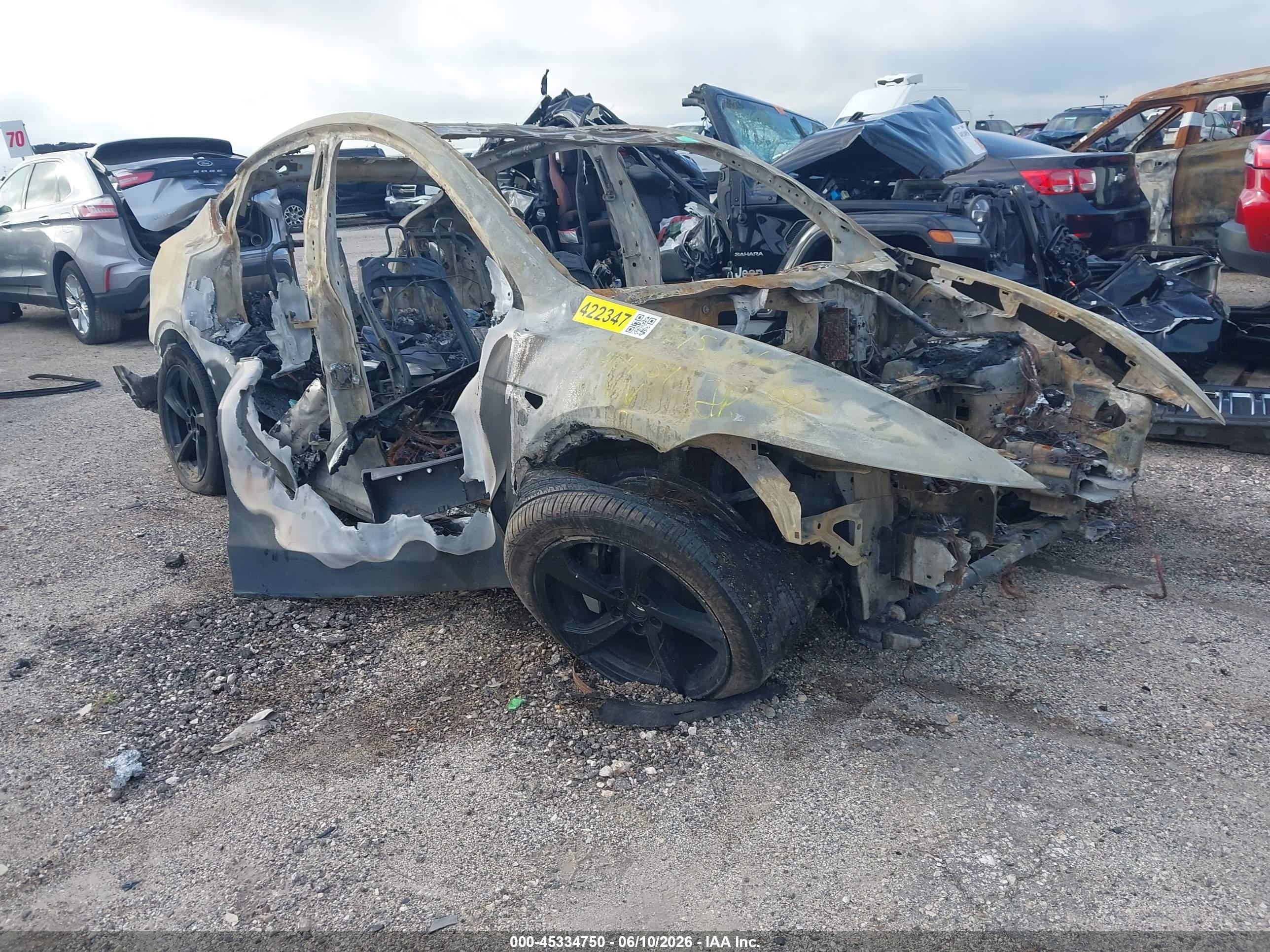 2026 Tesla Model Y Long Range, VIN 7SAYGDED8TA478576 — Burn
