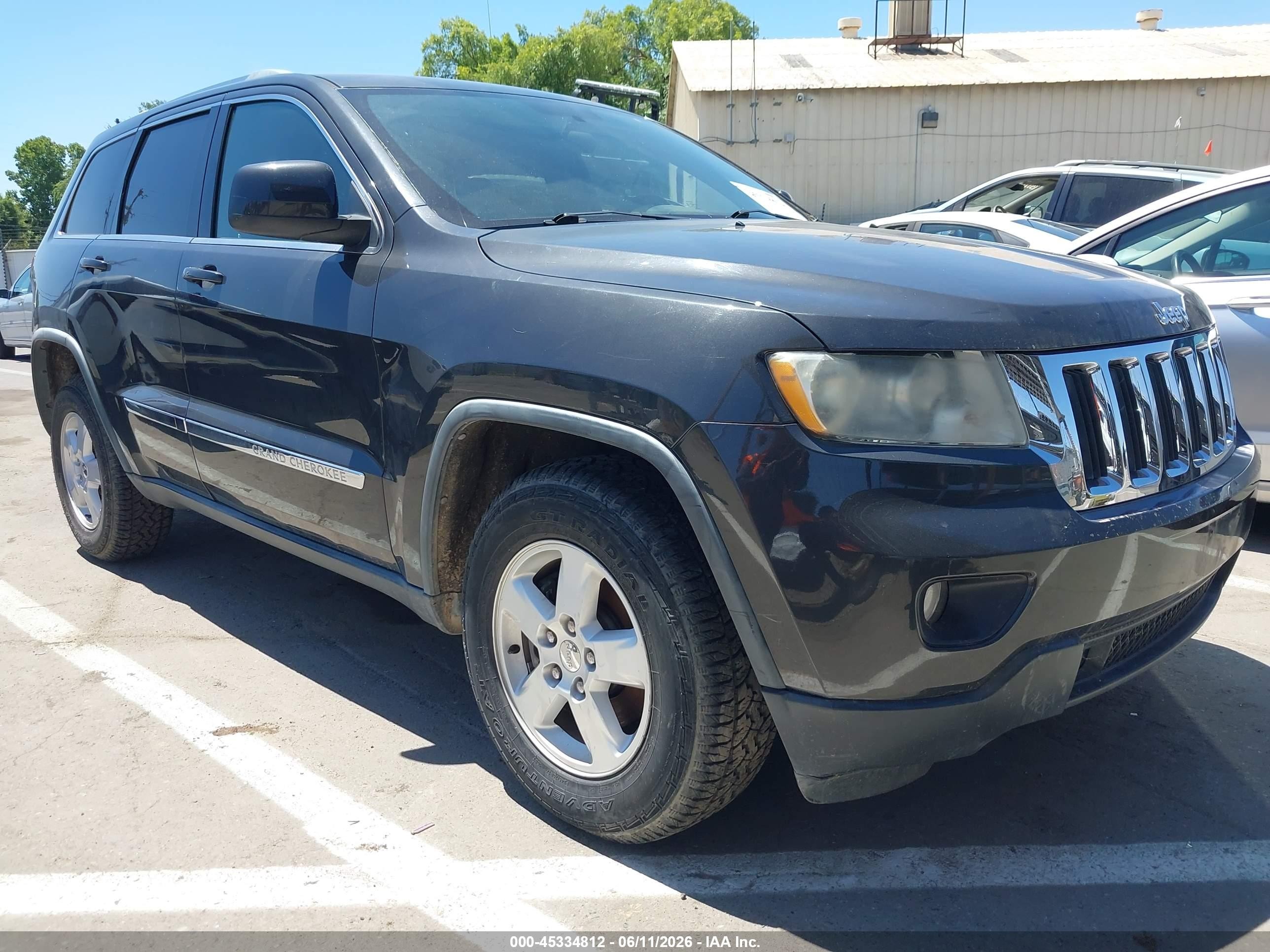 2011 Jeep Grand Cherokee Laredo, VIN 1J4RR4GG4BC654650 — Normal wear