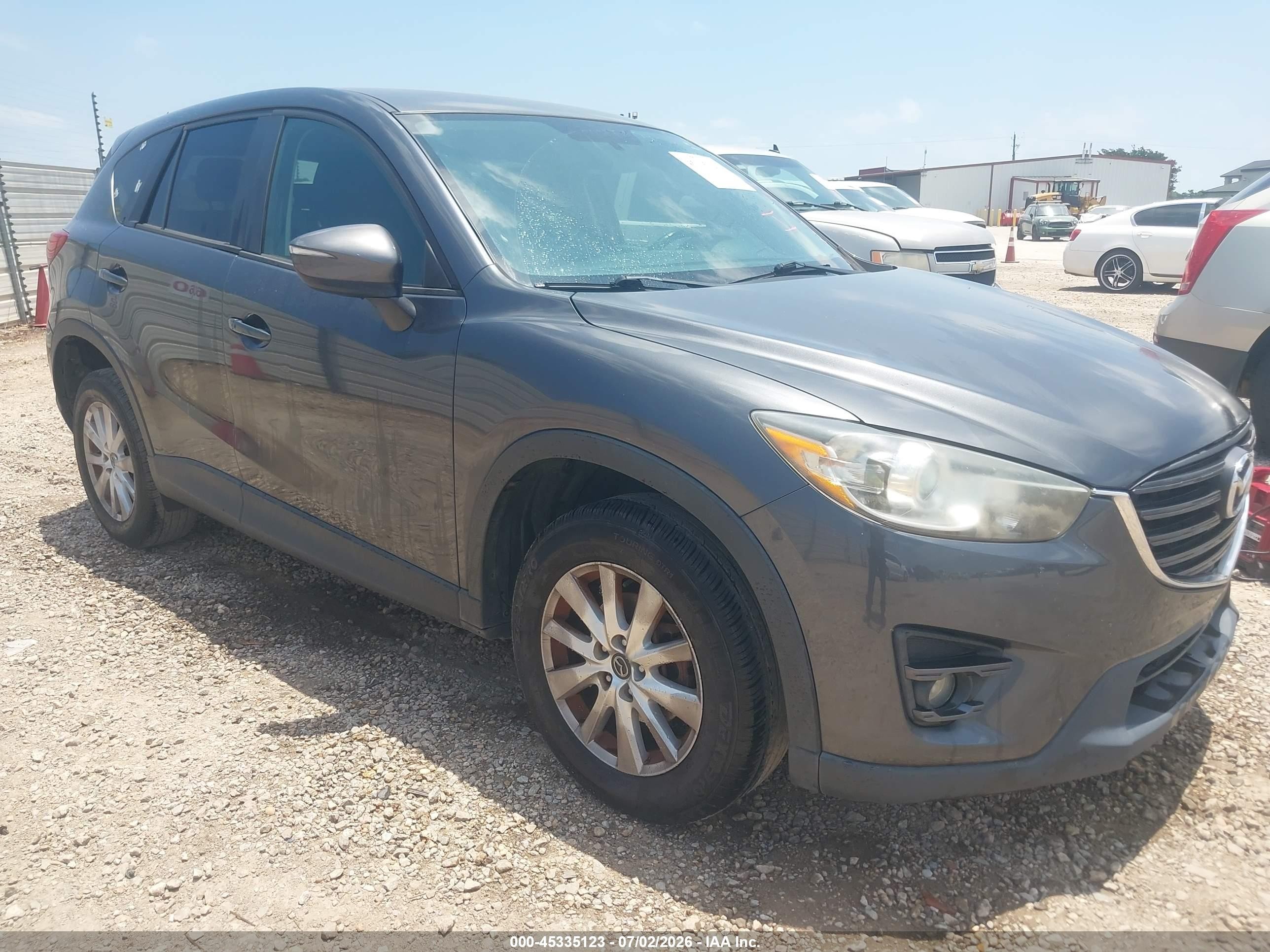 2016 Mazda CX-5 Touring, VIN JM3KE2CY8G0769970 — Rear end