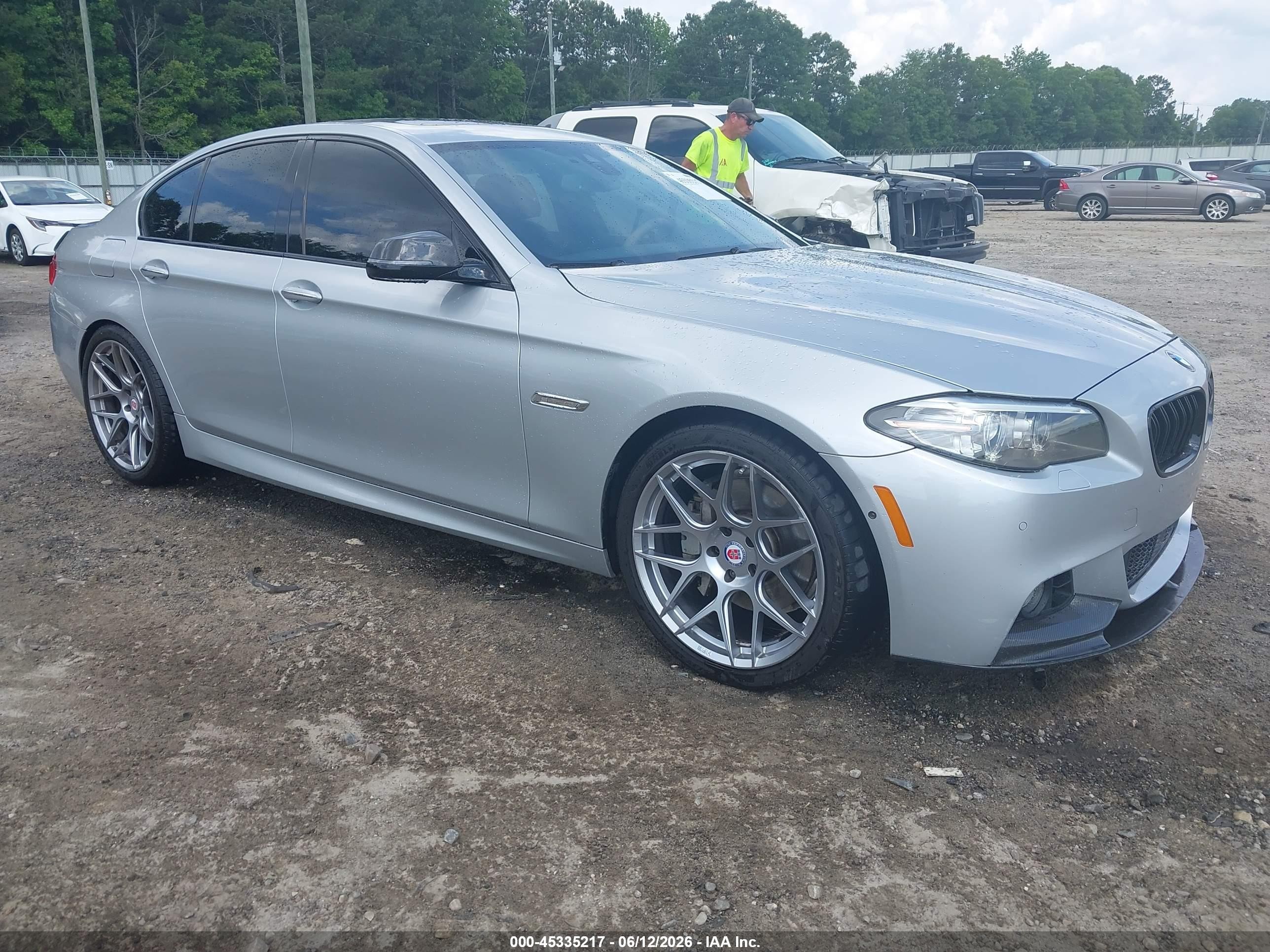 2016 BMW 5 Series 550i, VIN WBAKN9C57GD962074 — Side
