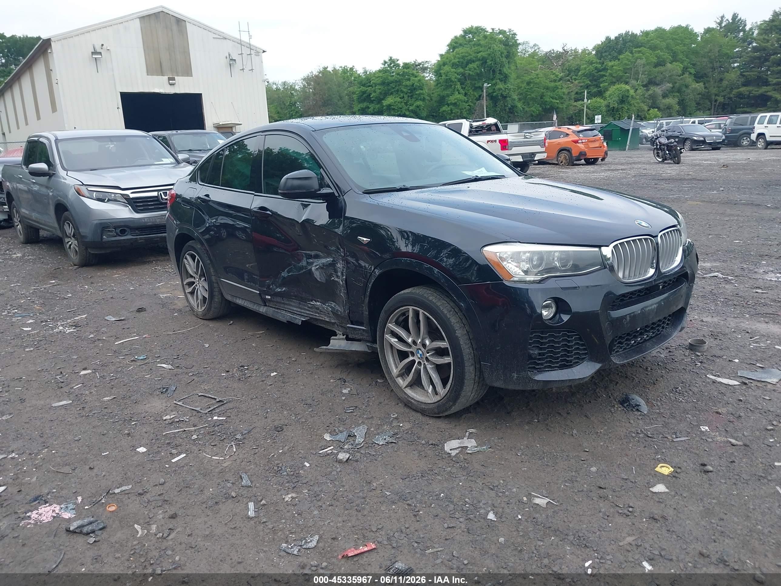 2016 BMW X4 xDrive28i, VIN 5UXXW3C51G0R18578 — Бок