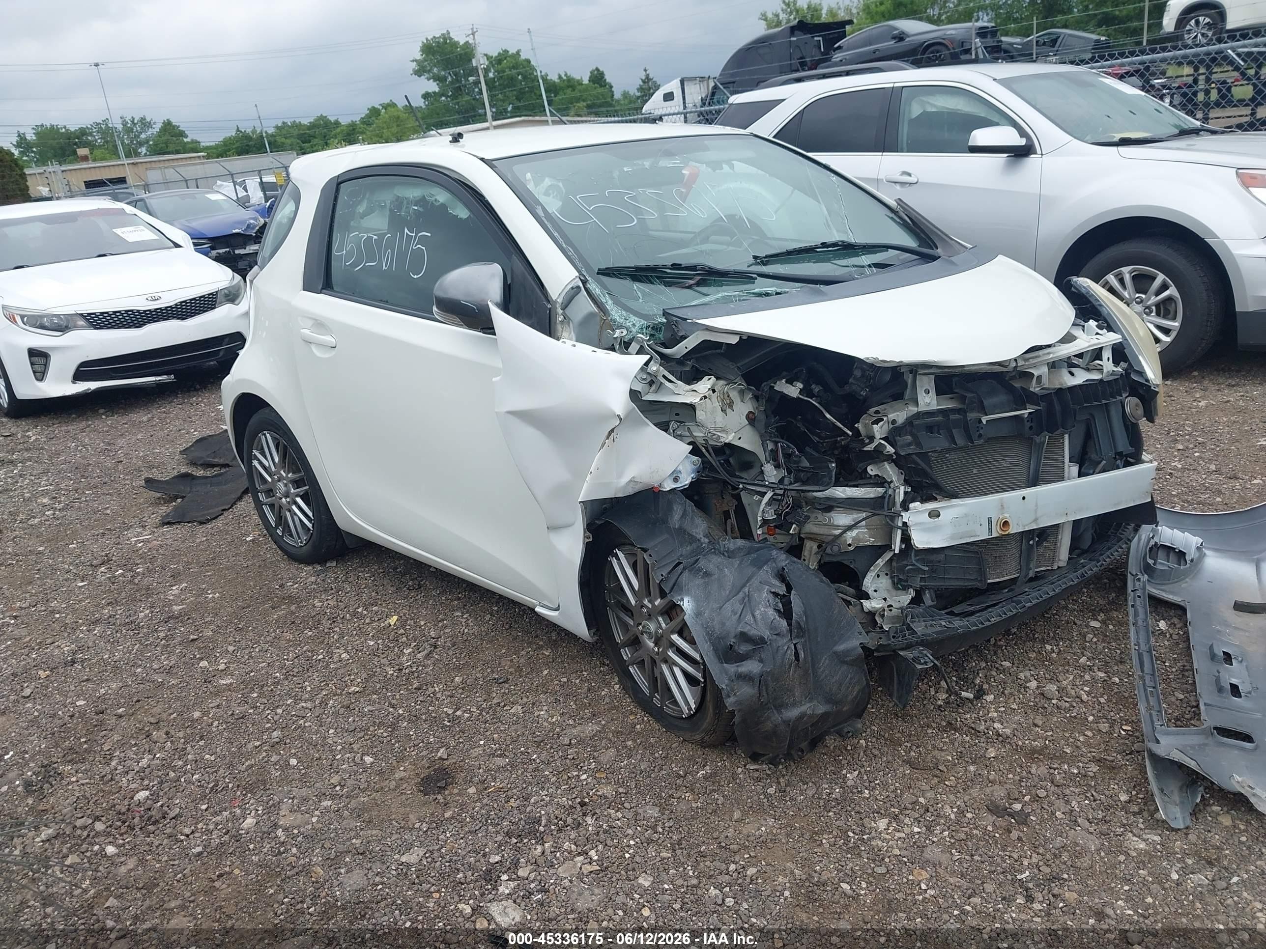 2012 Scion iQ, VIN JTNJJXB02CJ011597 — Front end