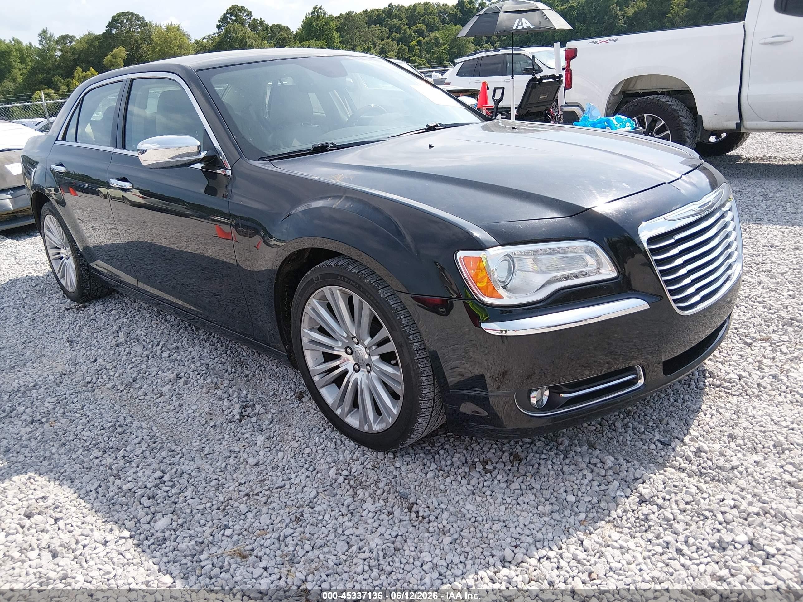 2011 Chrysler 300 C, VIN 2C3CA6CT4BH593769 — Side