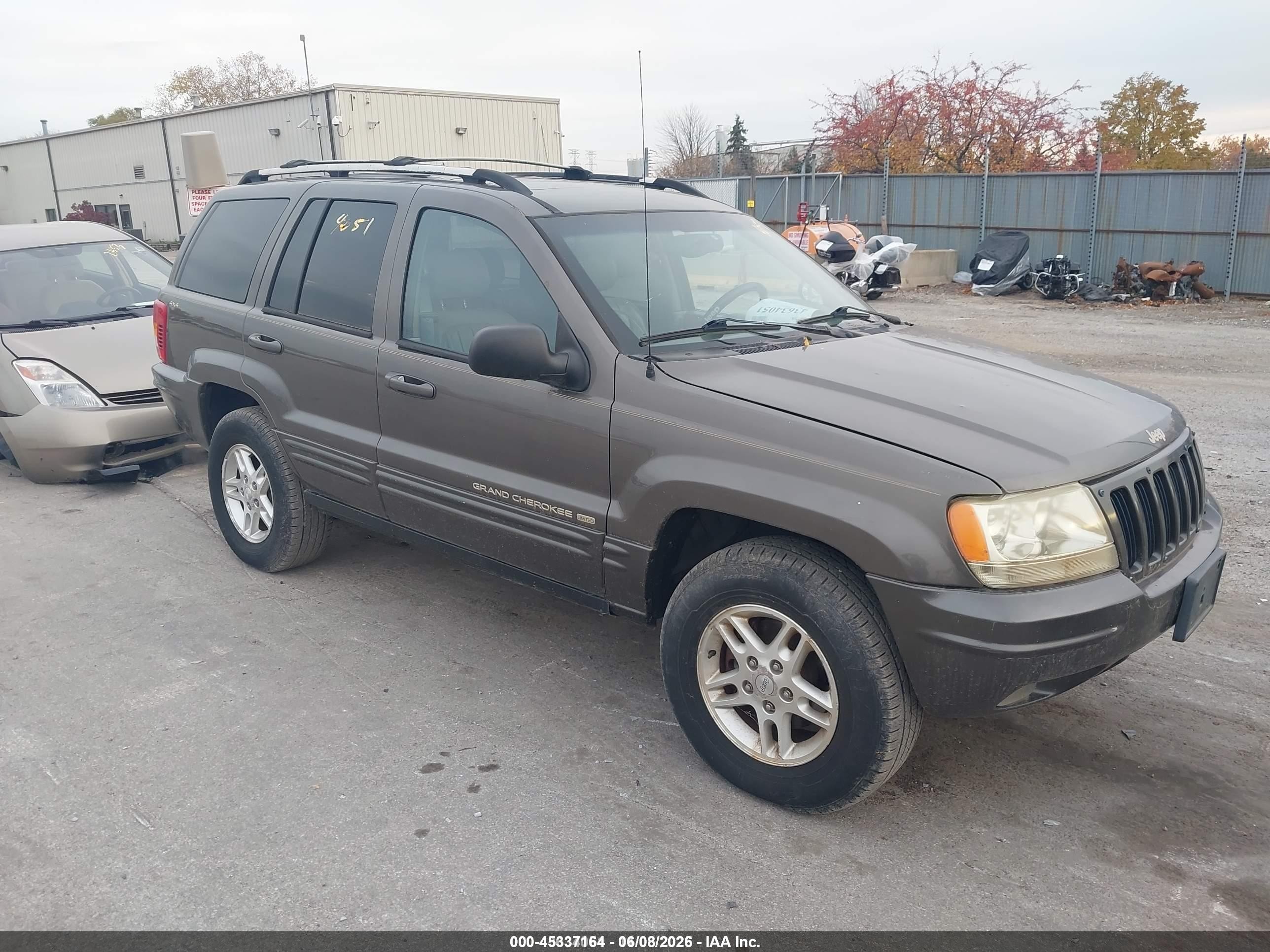 1999 Jeep Grand Cherokee Limited, VIN 1J4GW68N5XC738654 — Not stated