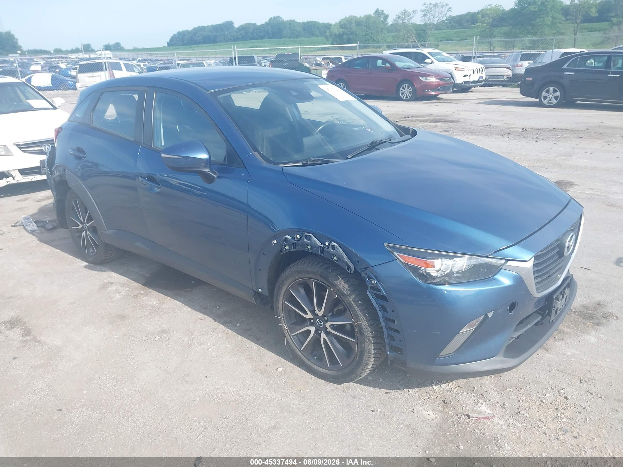 2018 Mazda CX-3 Touring, VIN JM1DKFC7XJ0316188 — Rear end