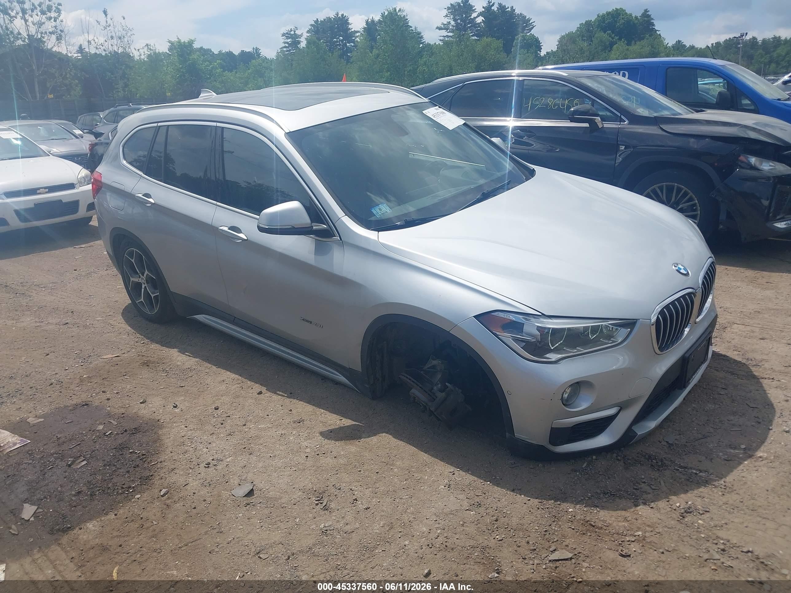 2018 BMW X1 xDrive28i, VIN WBXHT3C3XJ5K23560 — Front end