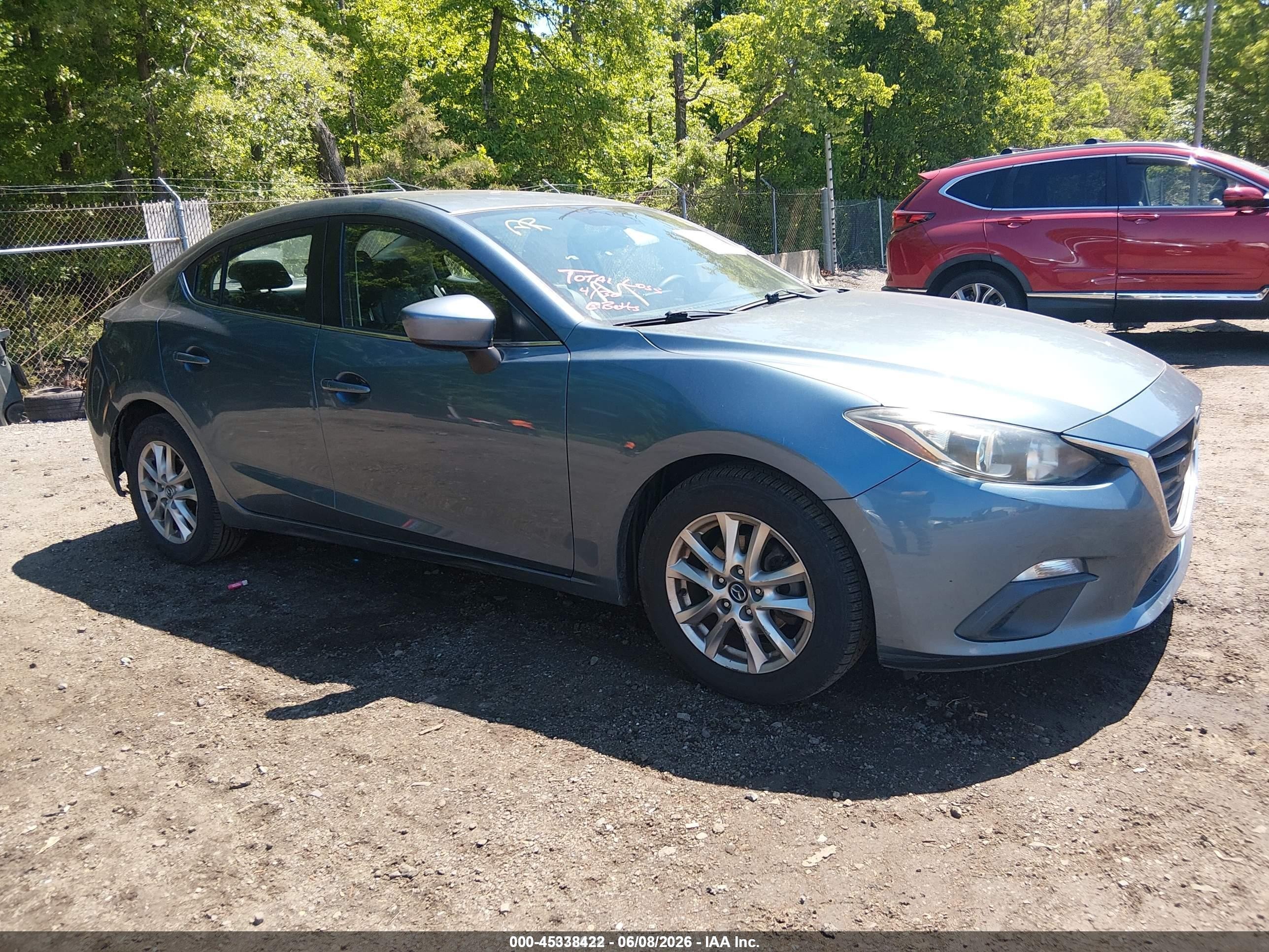 2014 Mazda 3 i Grand Touring, VIN JM1BM1W72E1123422 — Зад