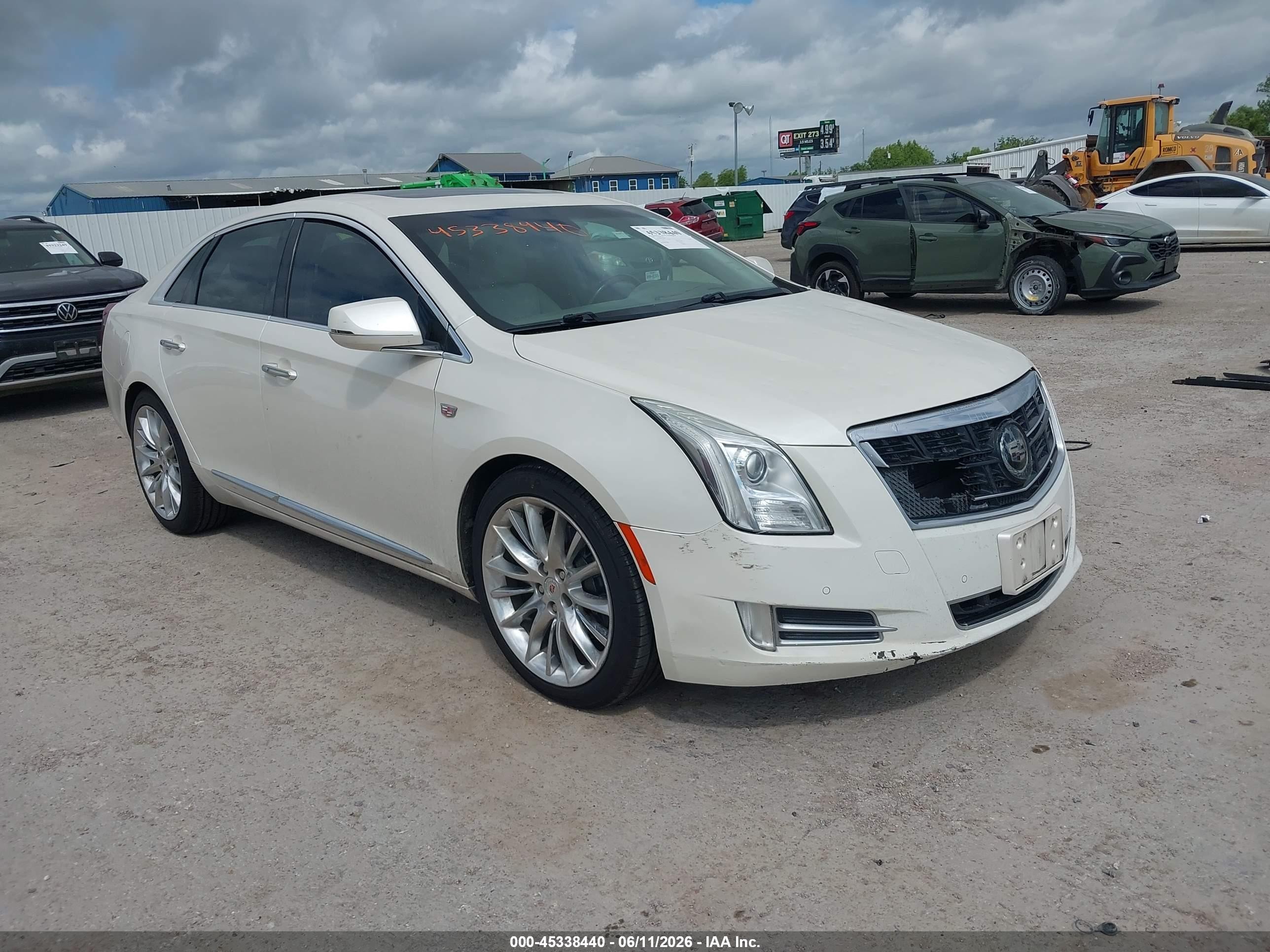 2014 Cadillac XTS Platinum, VIN 2G61W5S83E9134441 — Hail
