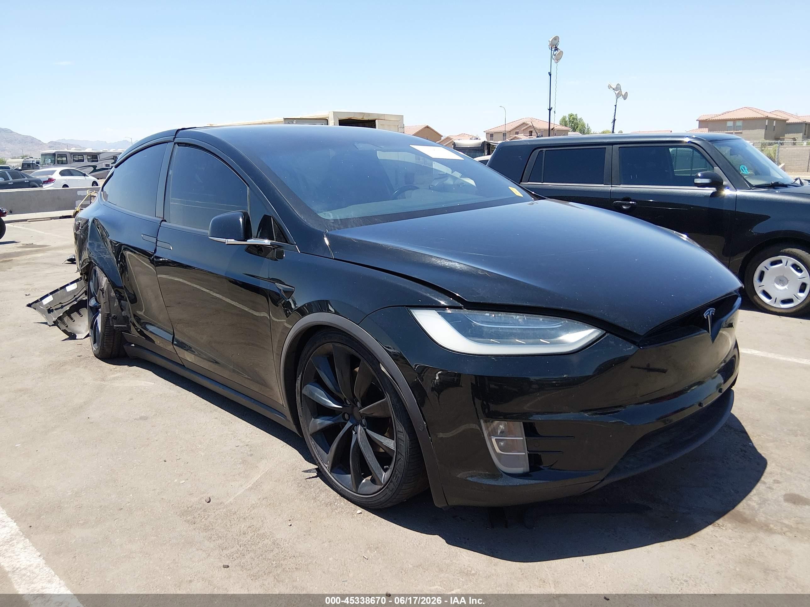 2018 Tesla Model X 75D, VIN 5YJXCDE20JF102201 — Side