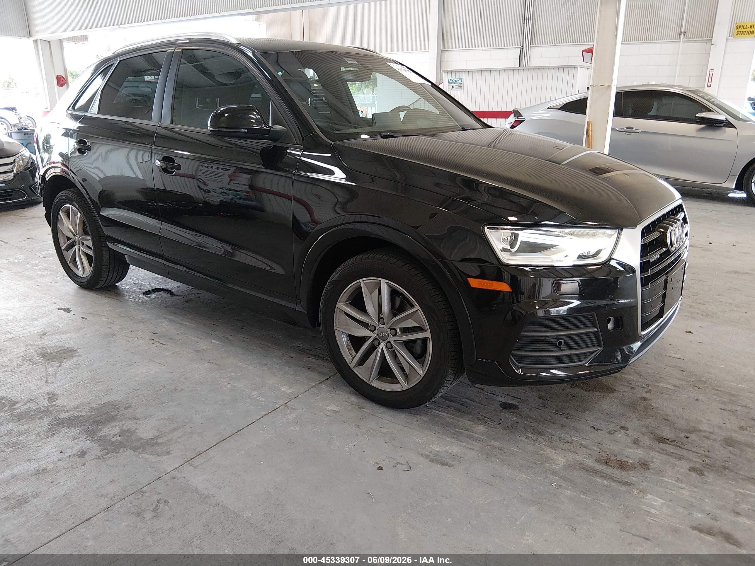 2017 Audi Q3 Premium, VIN WA1ECCFS2HR017634 — Rear end