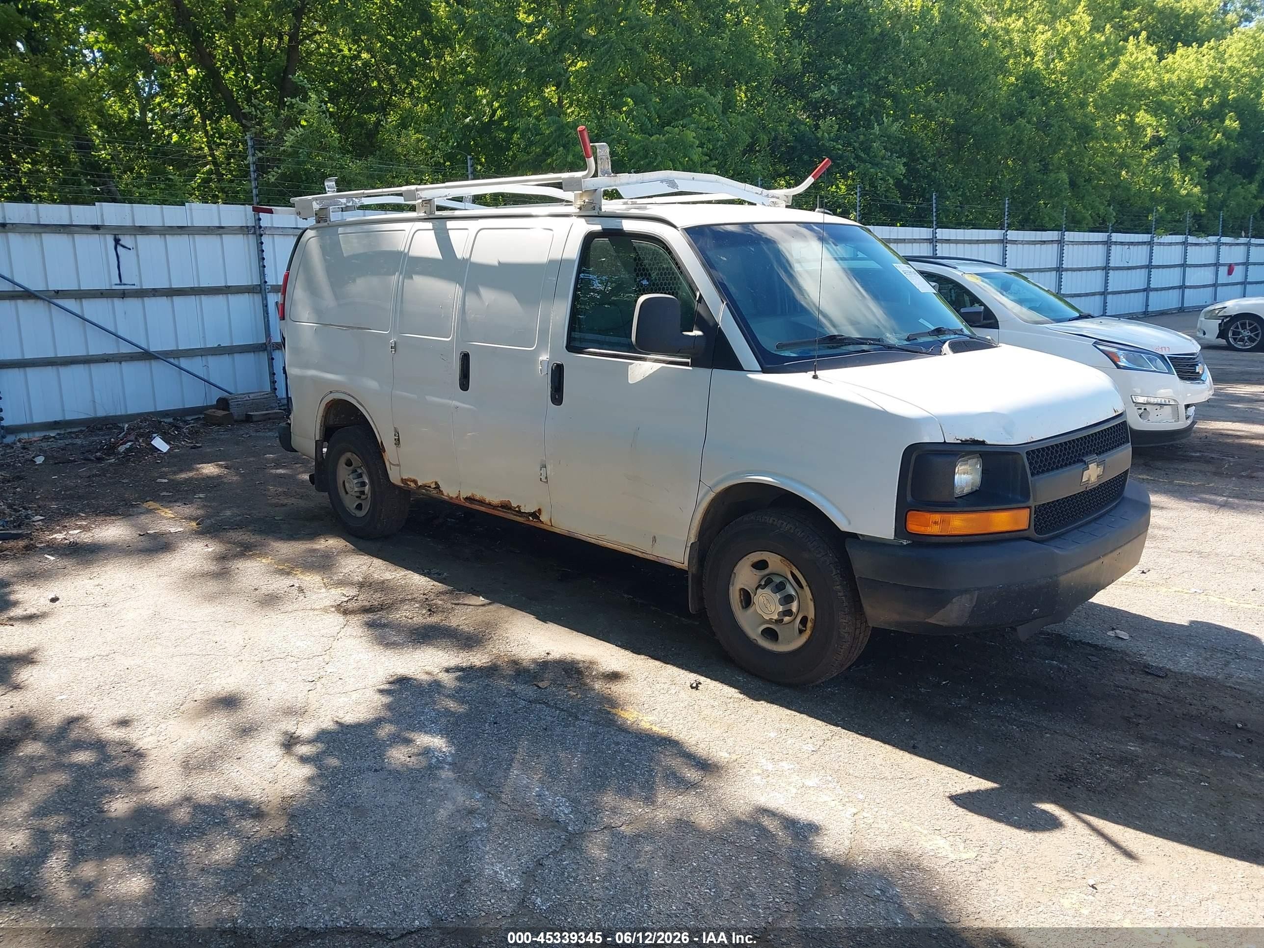 2015 Chevrolet Express Cargo, VIN 1GCWGFFF3F1122973 — Rear end