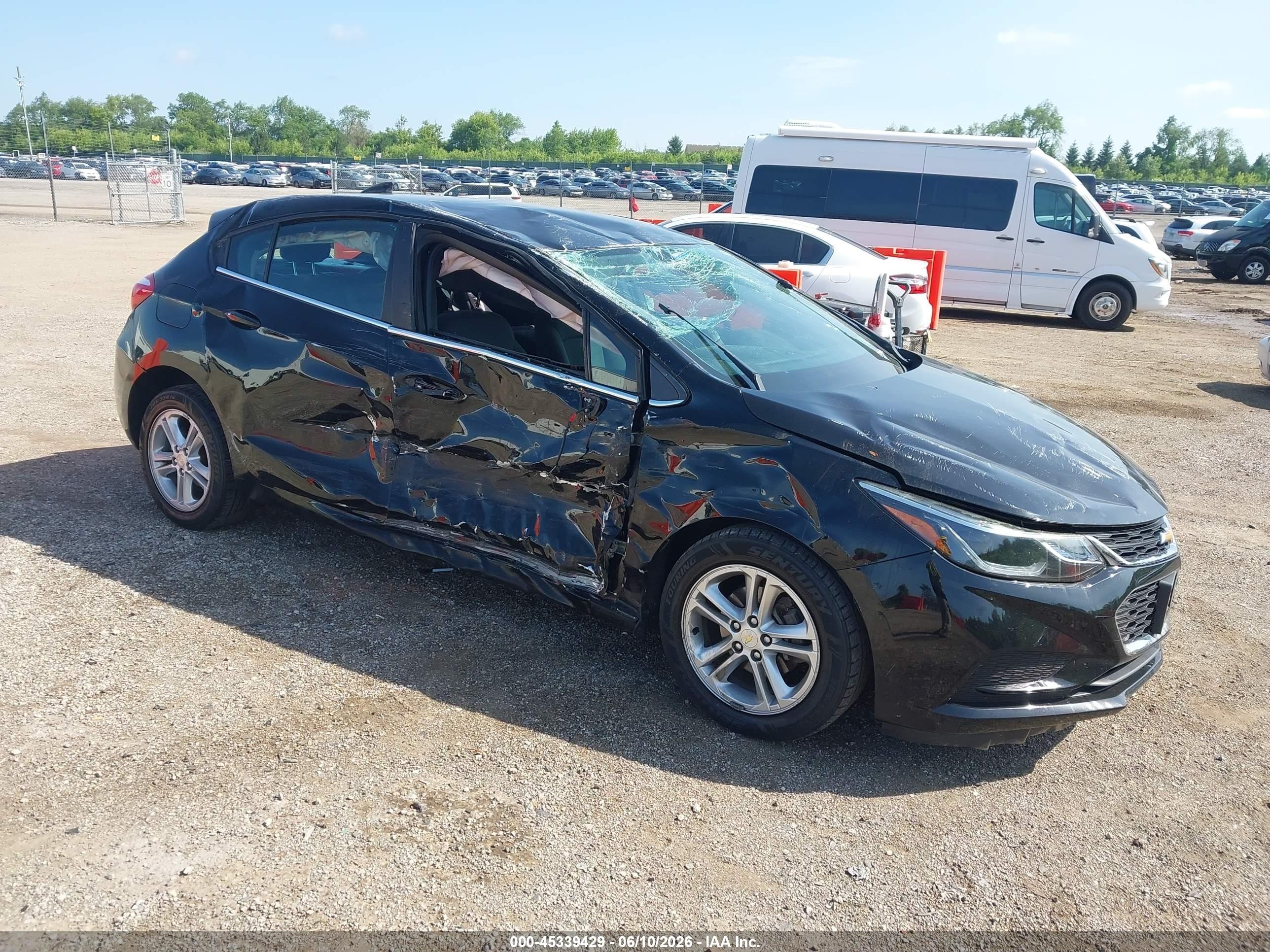 2018 Chevrolet Cruze LT, VIN 3G1BE6SM0JS602364 — Rollover