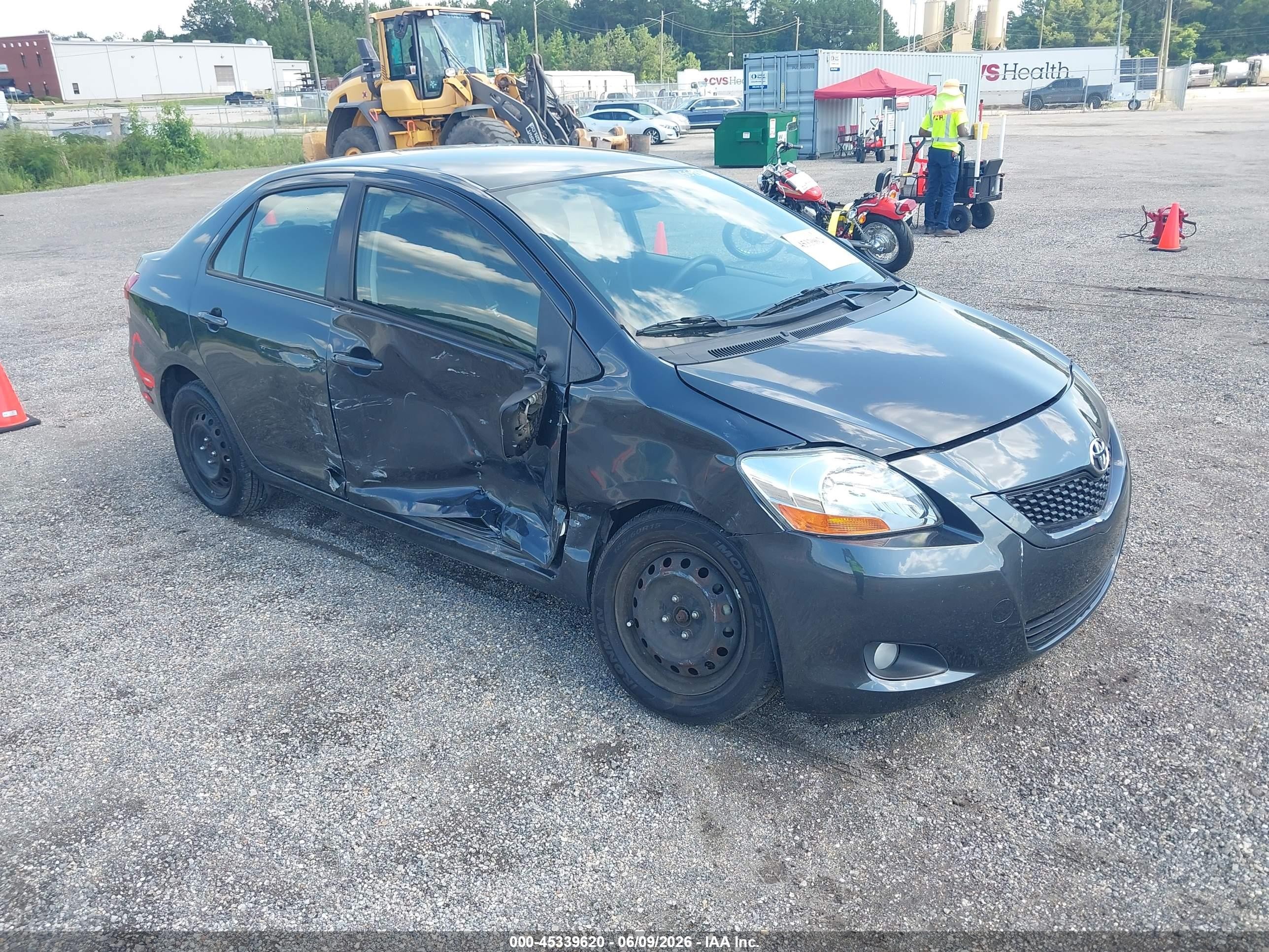 2009 Toyota Yaris, VIN JTDBT903894051119 — Side