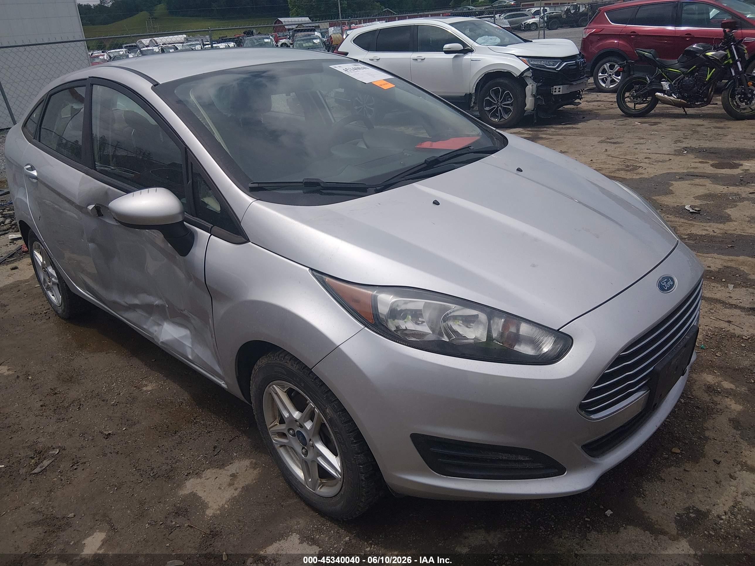 2017 Ford Fiesta SE, VIN 3FADP4BJ1HM161689 — Side