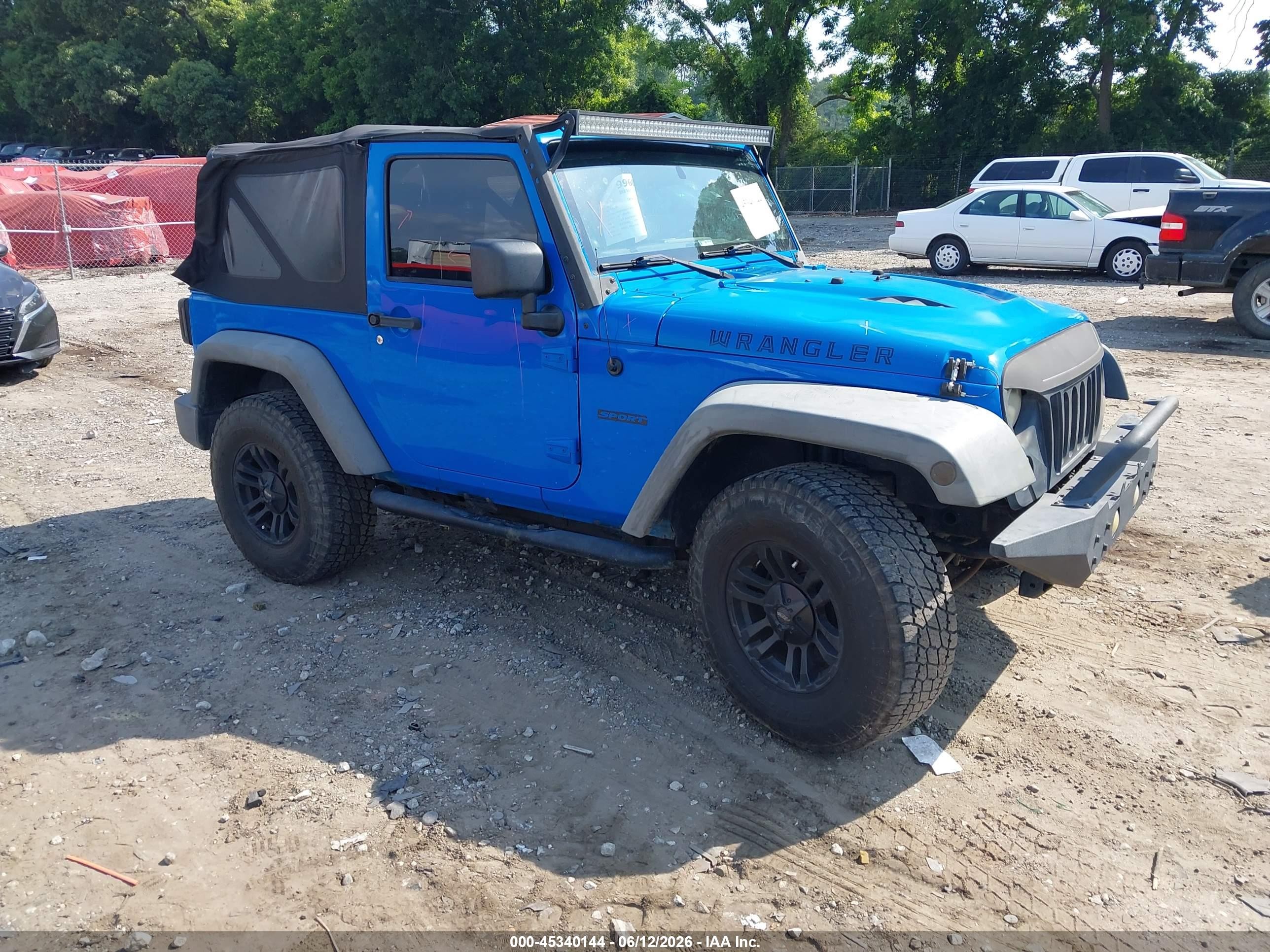 2012 Jeep Wrangler Sport, VIN 1C4AJWAG4CL144105 — Front end