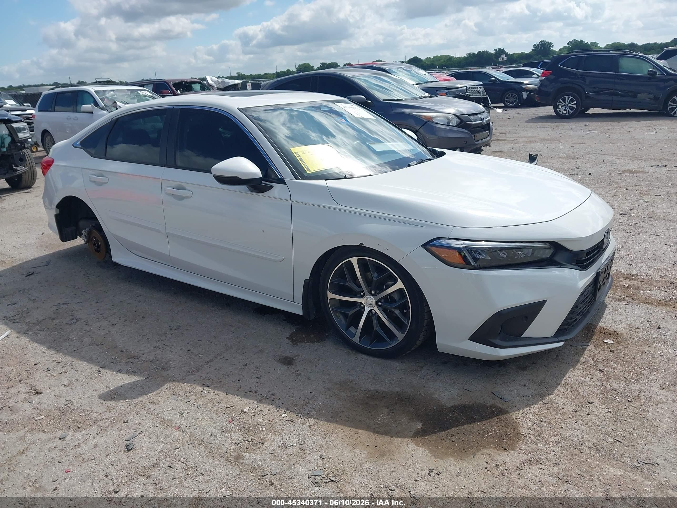2024 Honda Civic Touring, VIN 2HGFE1F92RH321717 — Front end