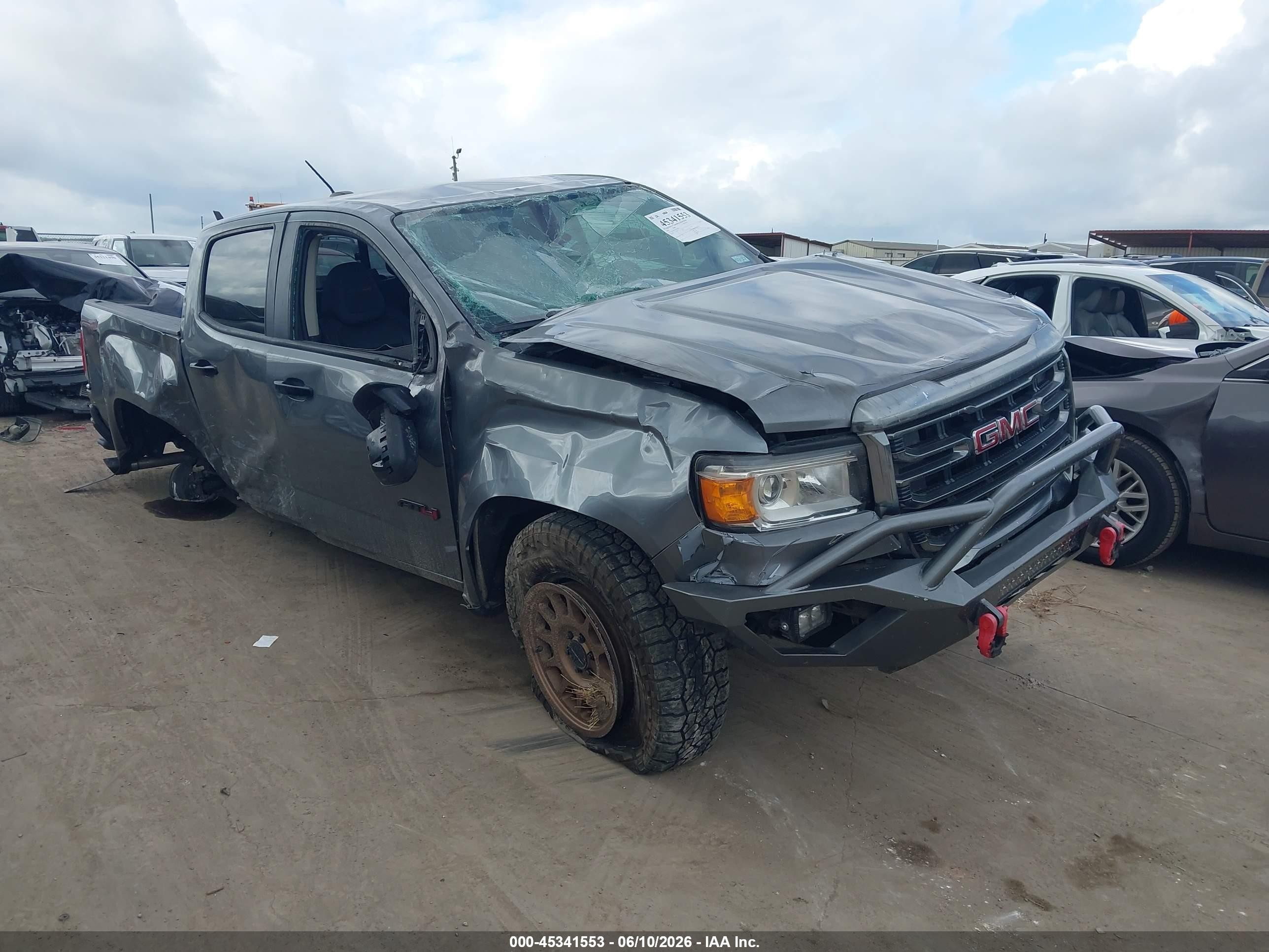 2021 GMC Canyon 4WD AT4, VIN 1GTG6FEN3M1282820 — Бок