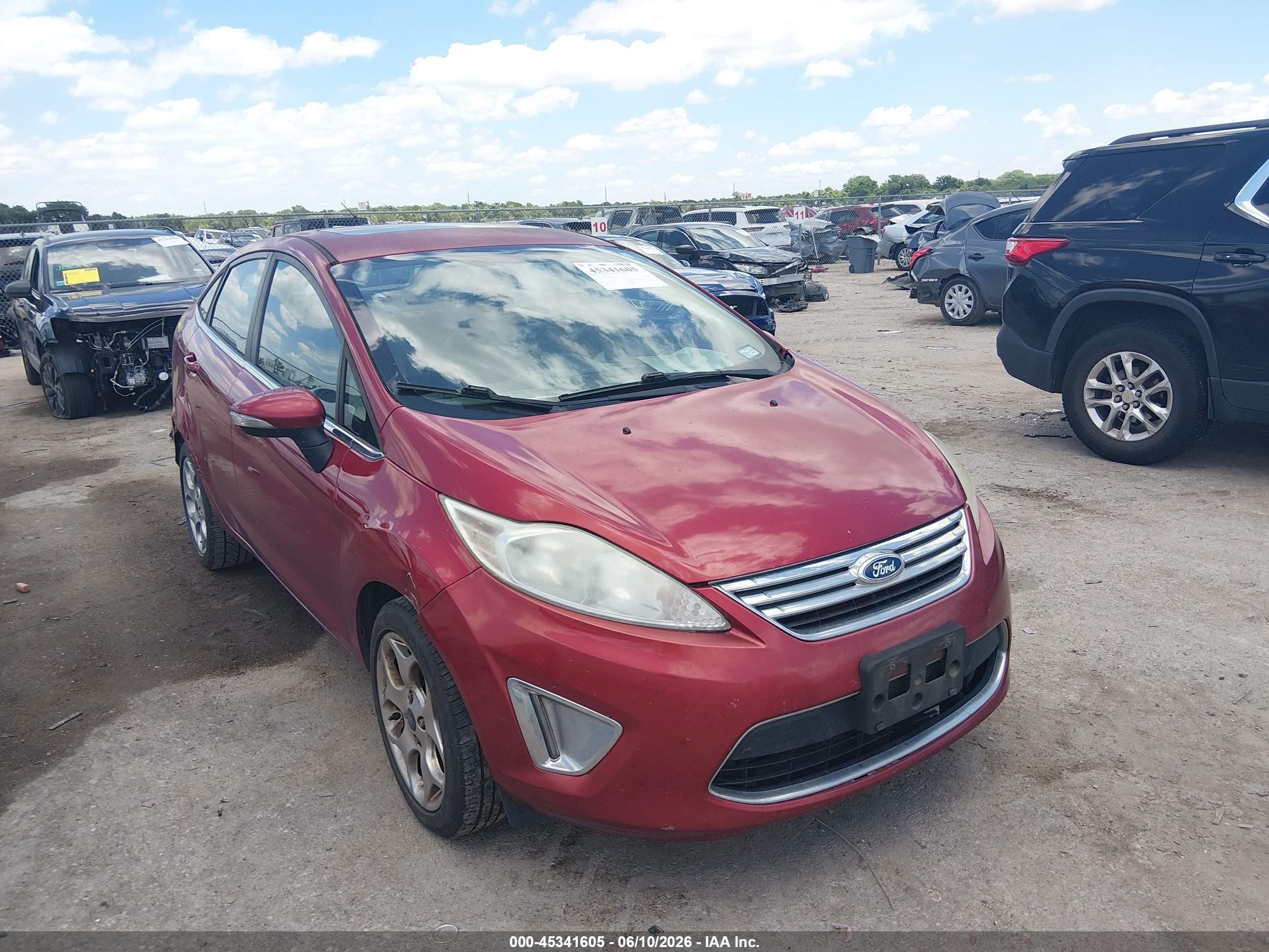 2013 Ford Fiesta Titanium, VIN 3FADP4CJ8DM194133 — Rear end