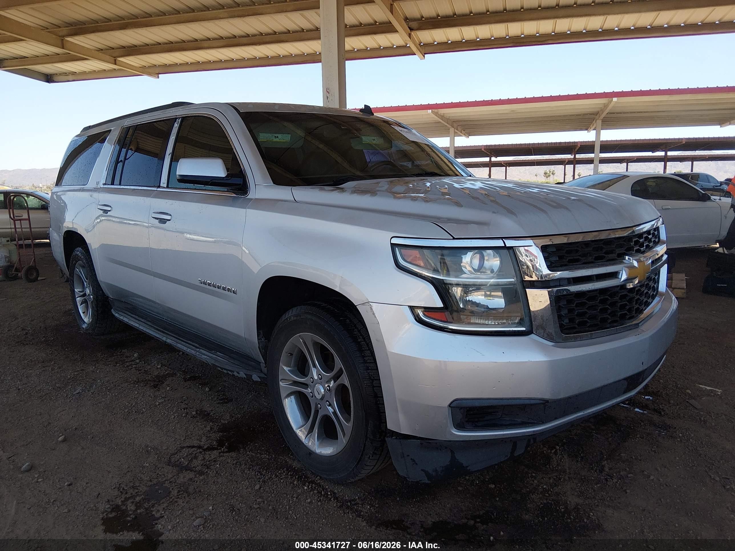 2015 Chevrolet Suburban LT, VIN 1GNSCJKCXFR199017 — Front end