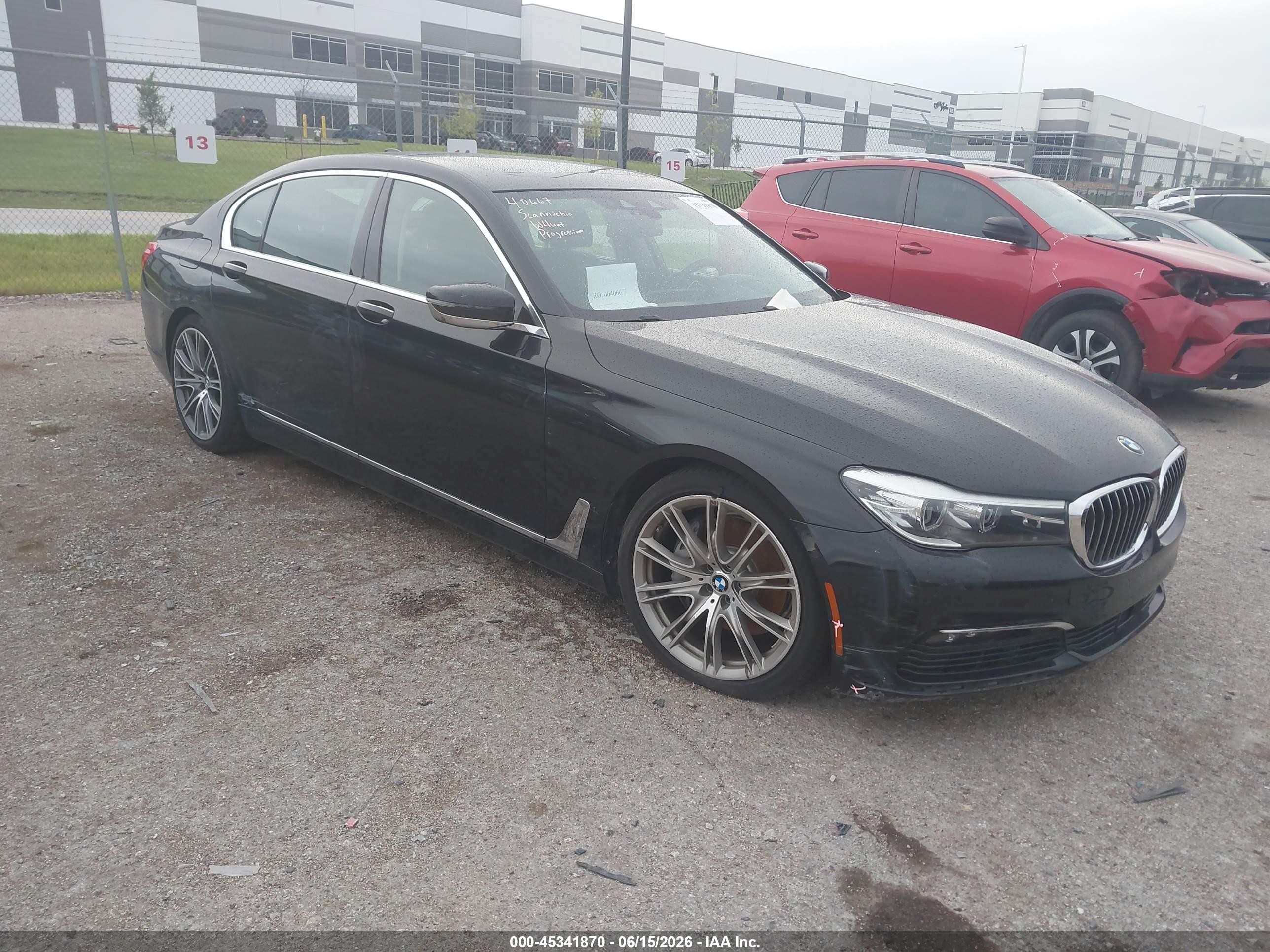 2018 BMW 7 Series 740i xDrive, VIN WBA7E4C51JGV23998 — Side