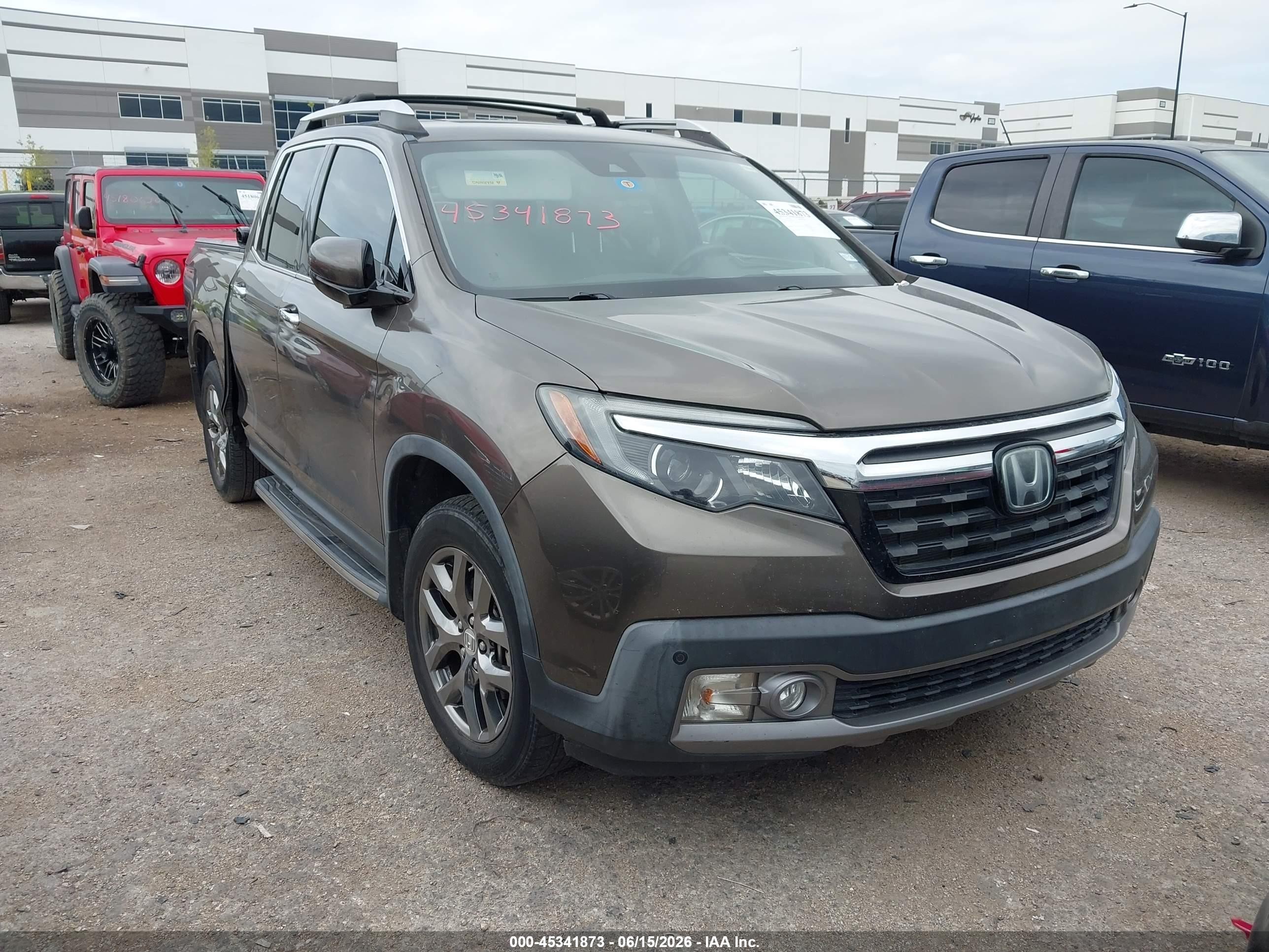 2020 Honda Ridgeline RTL-E, VIN 5FPYK3F77LB007169 — Side