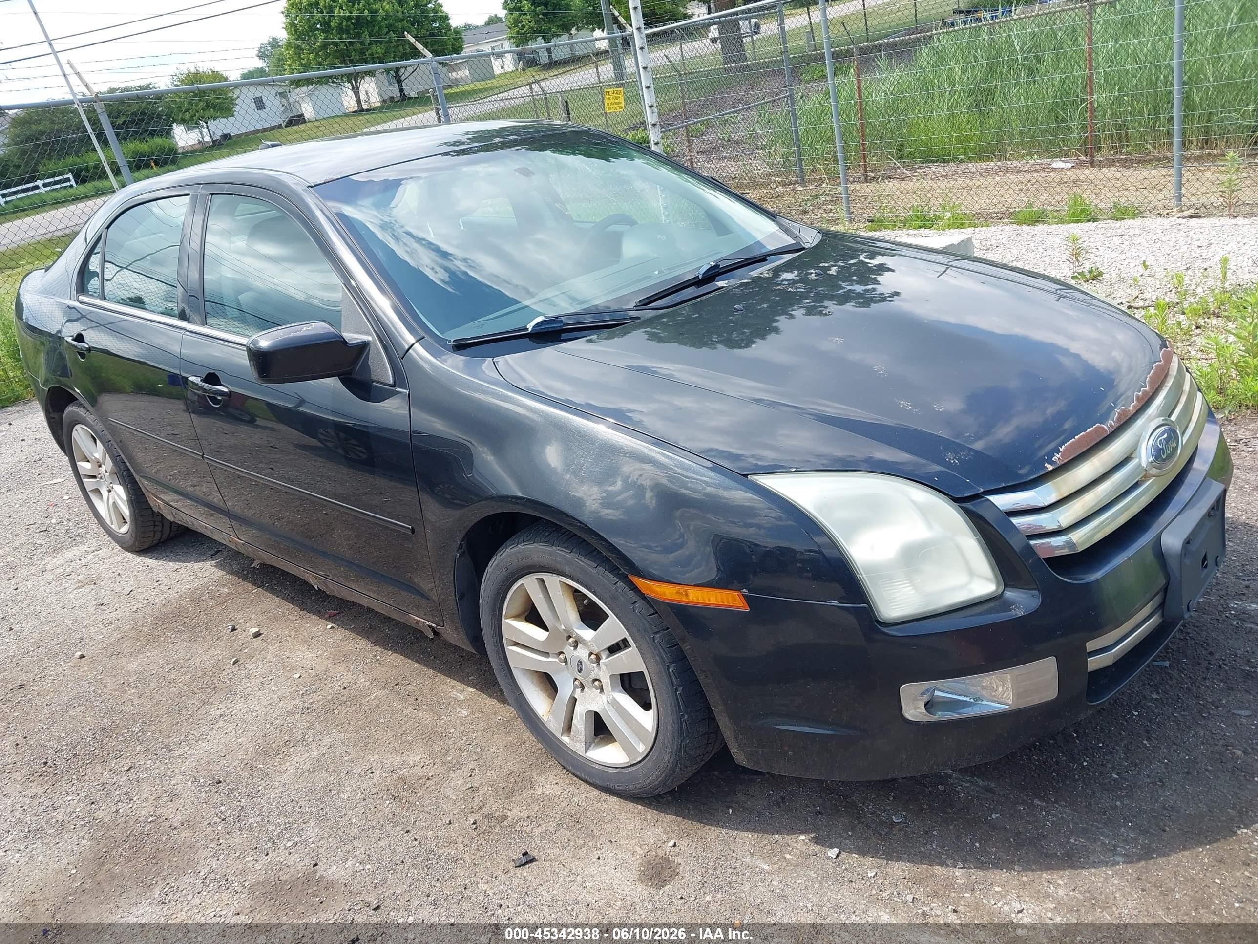2009 Ford Fusion SEL, VIN 3FAHP08129R120073 — Side
