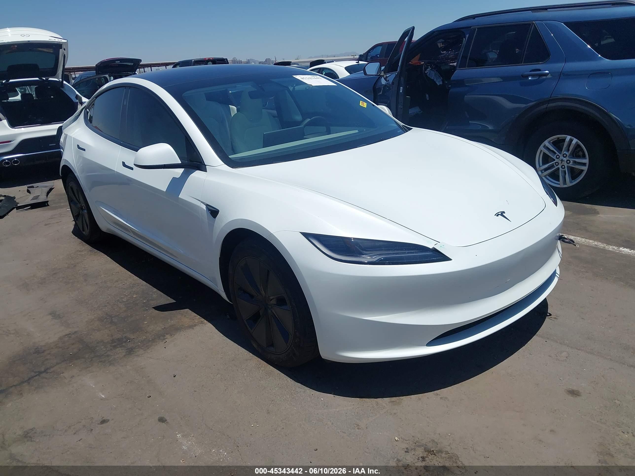 2026 Tesla Model 3 Premium, VIN 5YJ3E1EA4TF146297 — Rear end